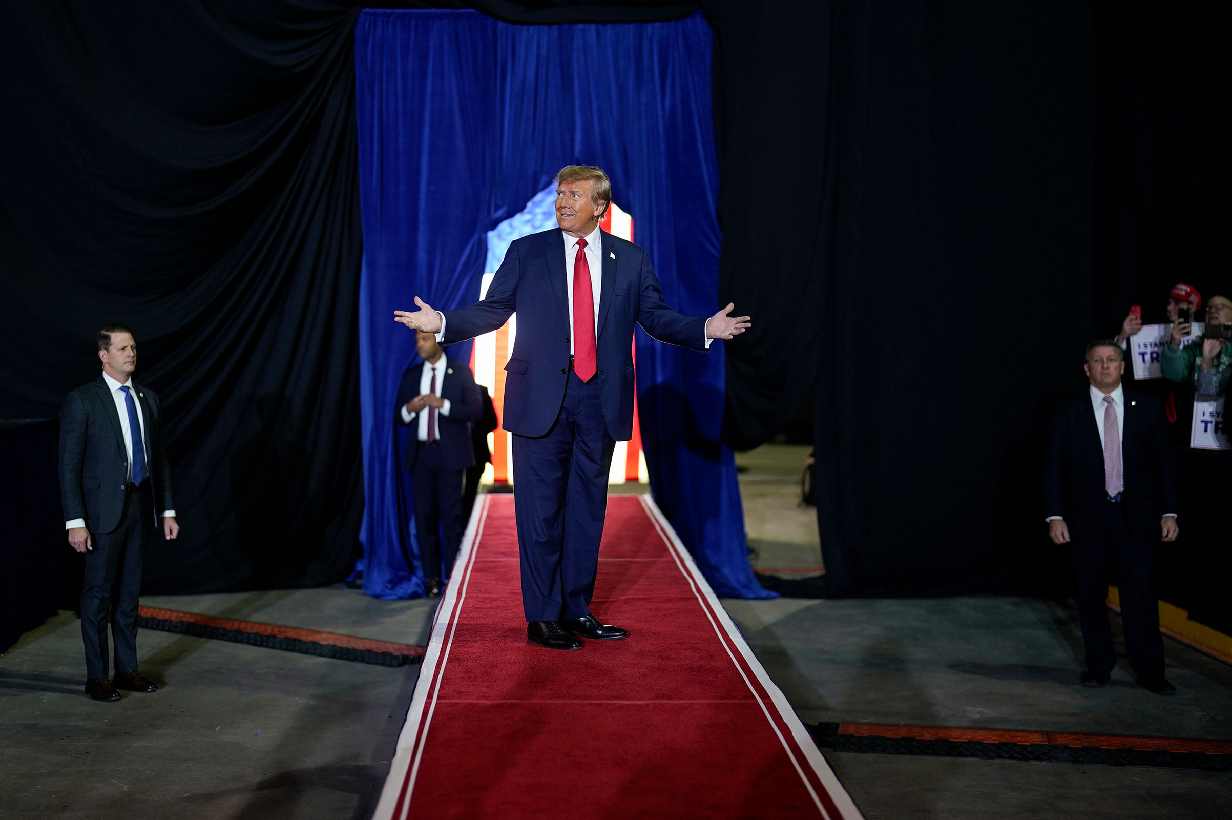 Former president Donald Trump steps out to deliver remarks at a campaign rally at the SNHU Arena in Manchester, New Hampshire, on January 20.