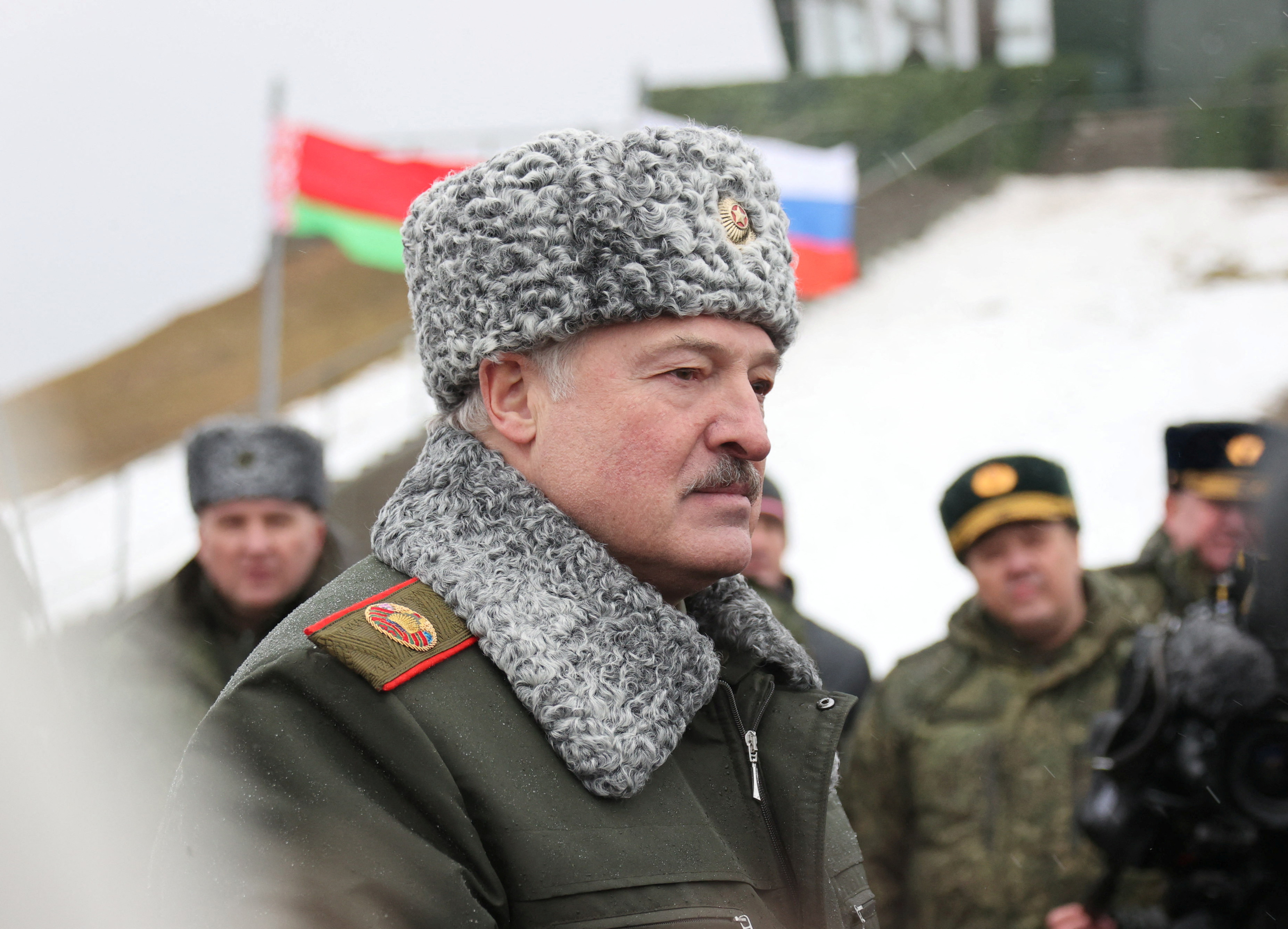 Belarusian President Alexander Lukashenko observes military exercises held by the armed forces of Russia and Belarus at the Osipovichsky training ground in the Mogilev region in Belarus, on February 17. 