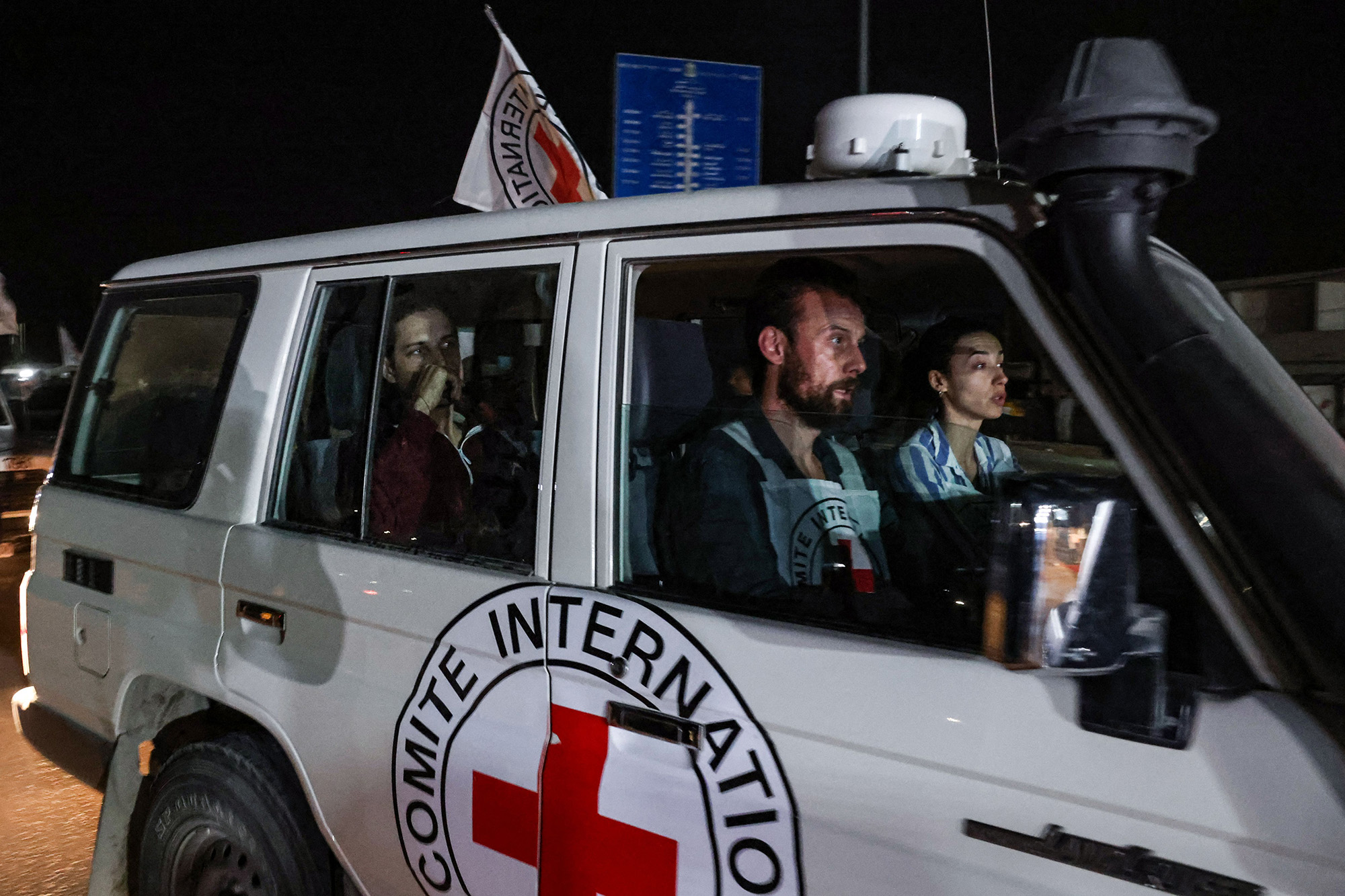 An International Red Cross vehicle carrying Israeli Russian hostage Ron Kriboy, released by Hamas, drives towards the Rafah border point with Egypt ahead of a transfer to Israel on November 26.