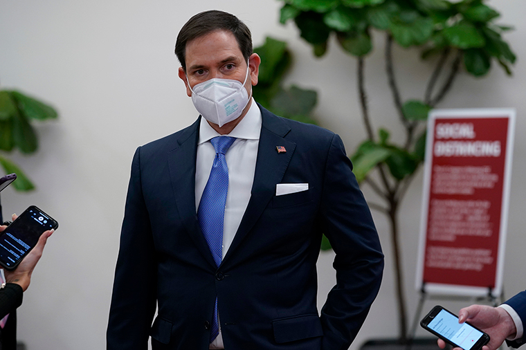 Sen. Marco Rubio talks with reporters as he leaves after the first day of the second impeachment trial of former President Donald Trump on Tuesday, February 9. 