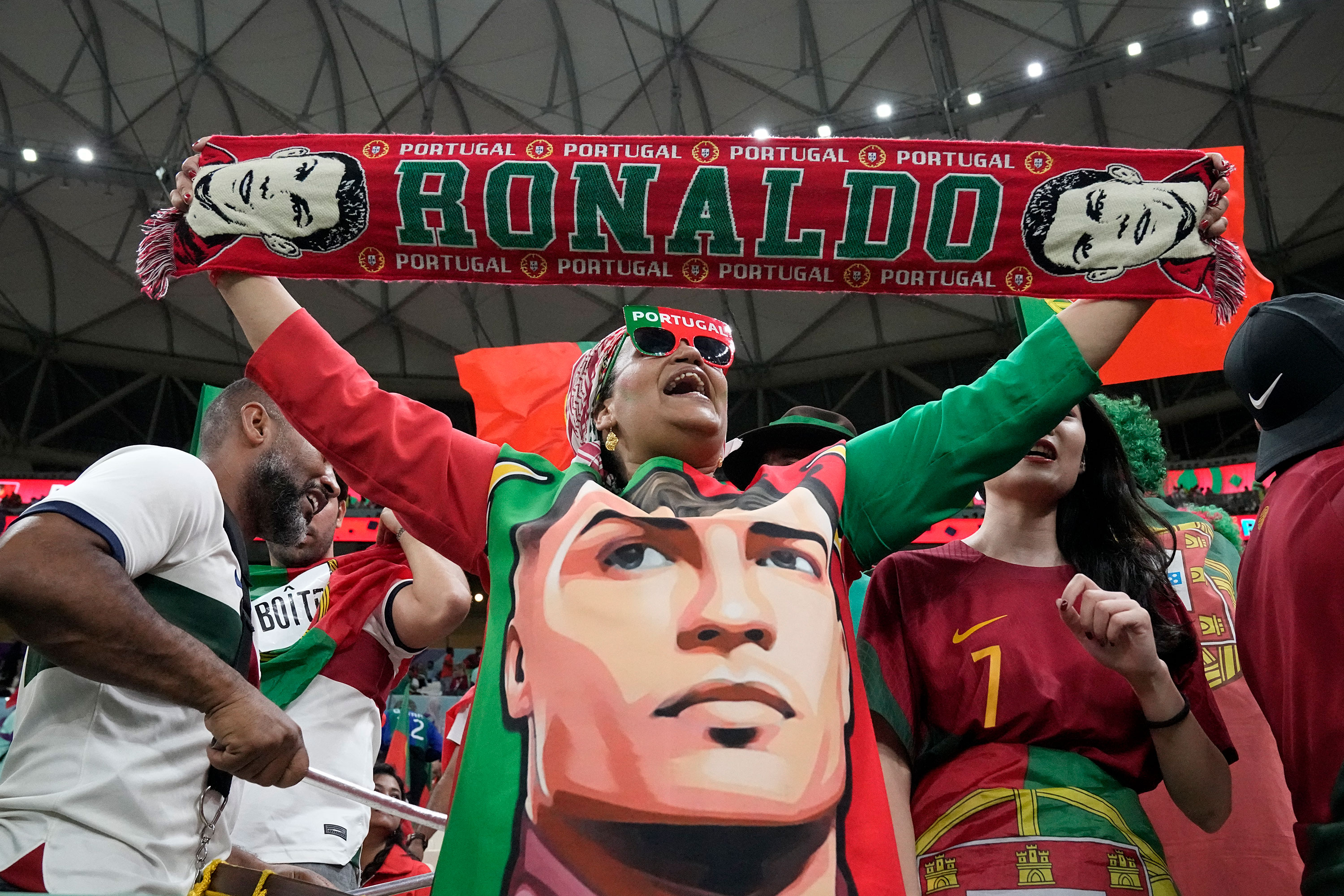 A Portugal fan cheers before the match between Portugal and Uruguay on Monday.