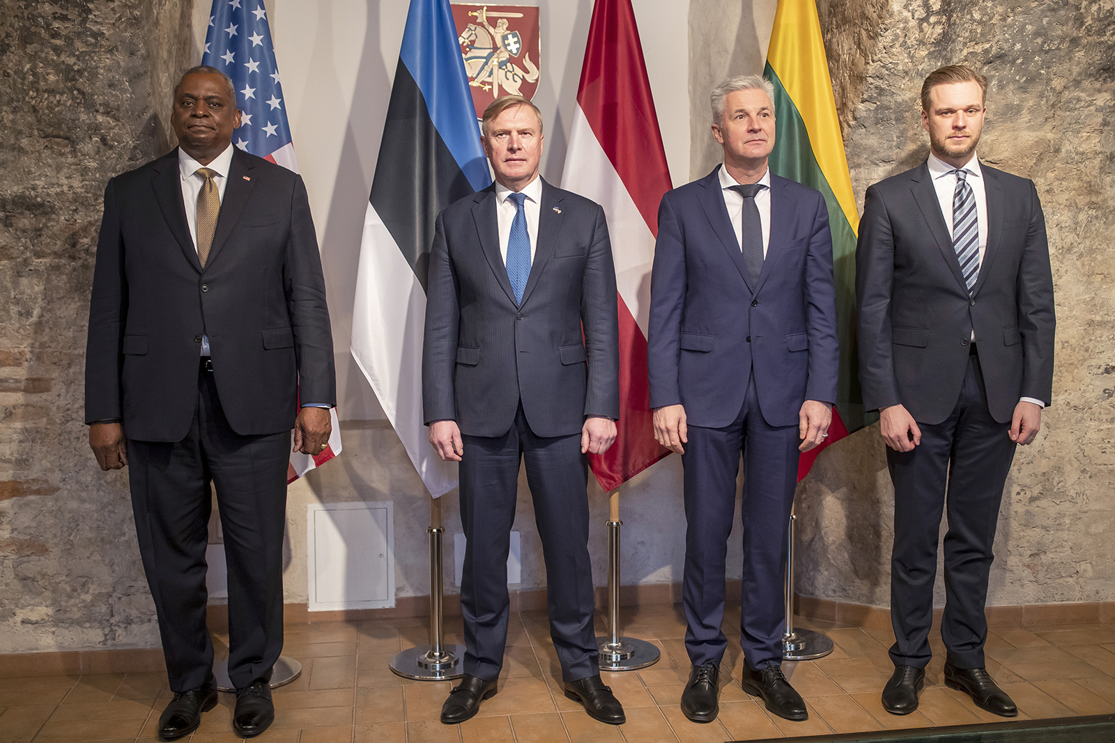 From left: US Secretary for Defense Lloyd J. Austin, Estonia's Minister of Defense Kalle Laanet, Latvia's Minister of Defense Artis Pabriks, and Lithuania's Minister of Foreign Affairs Gabrielius Landsbergis, pose for photographers during a meeting at the Defense Ministry in Vilnius, Lithuania, on February 19. 