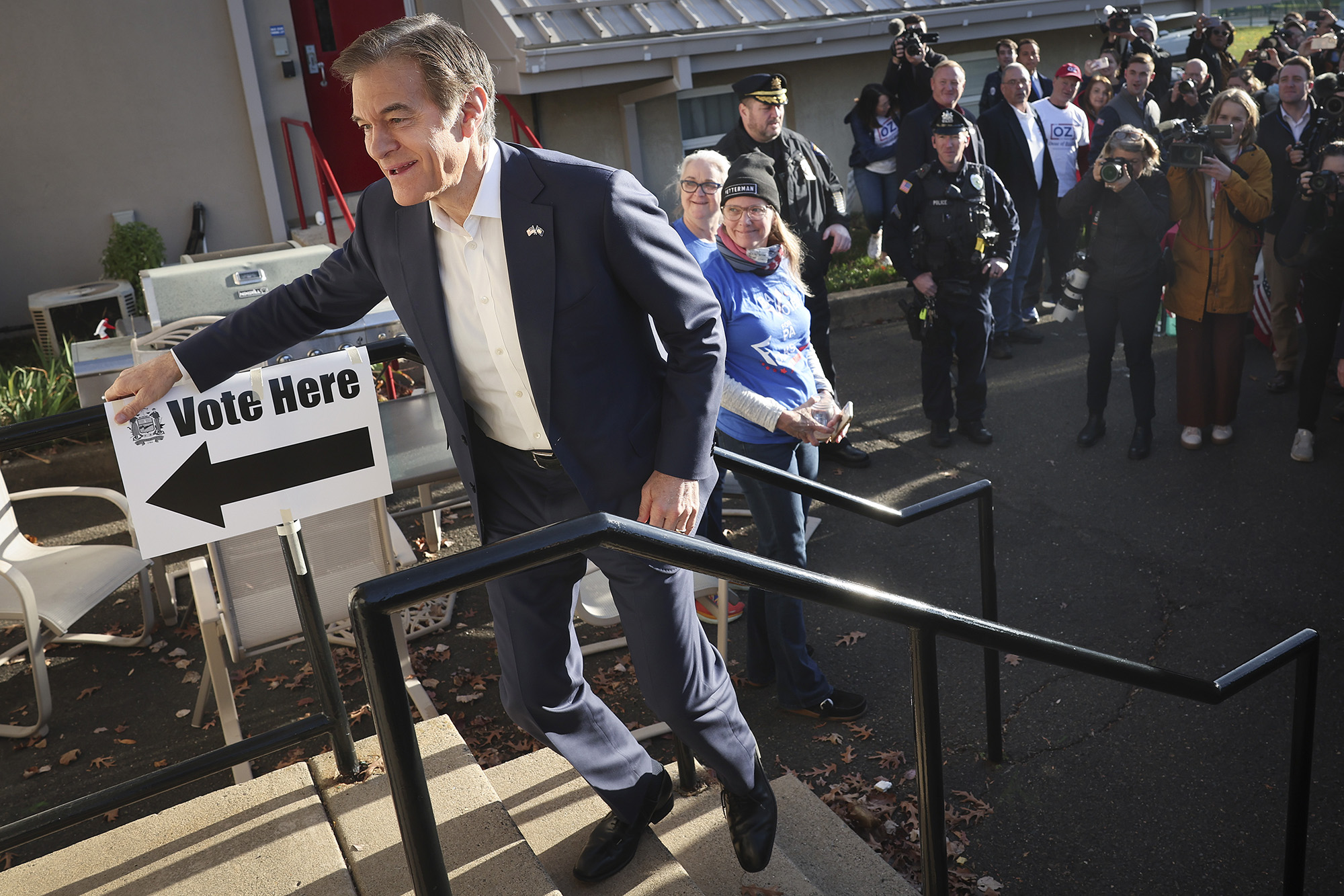 Republican U.S. Senate candidate Dr. Mehmet Oz enters the polling station at the Bryn Athyn Borough Hall to cast his ballot on November 8, in Huntingdon Valley, Pennsylvania. 
