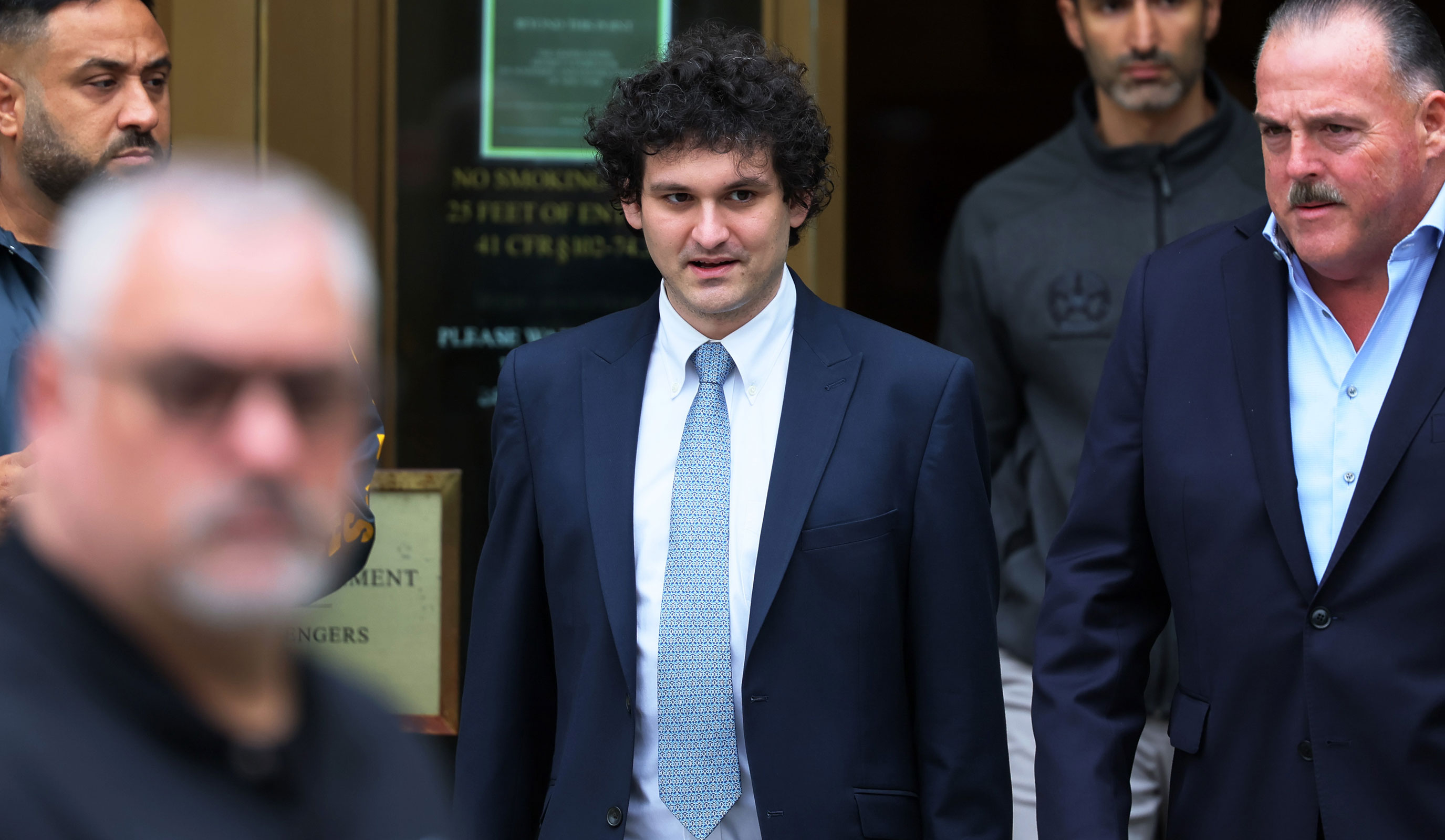 In this June 15 photo, FTX founder Sam Bankman-Fried leaves Manhattan Federal Court after a court appearance in New York.