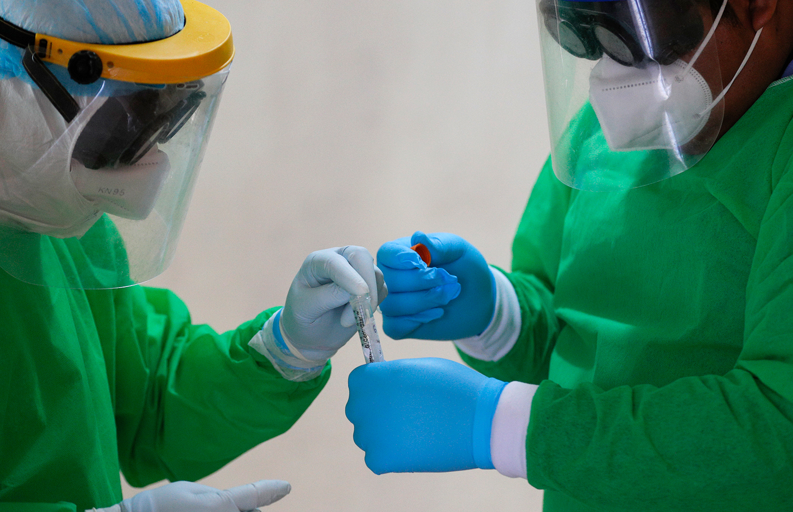 Health workers collect nasal swab samples to test for Covid-19, in Xochimilco, Mexico City on August 5.