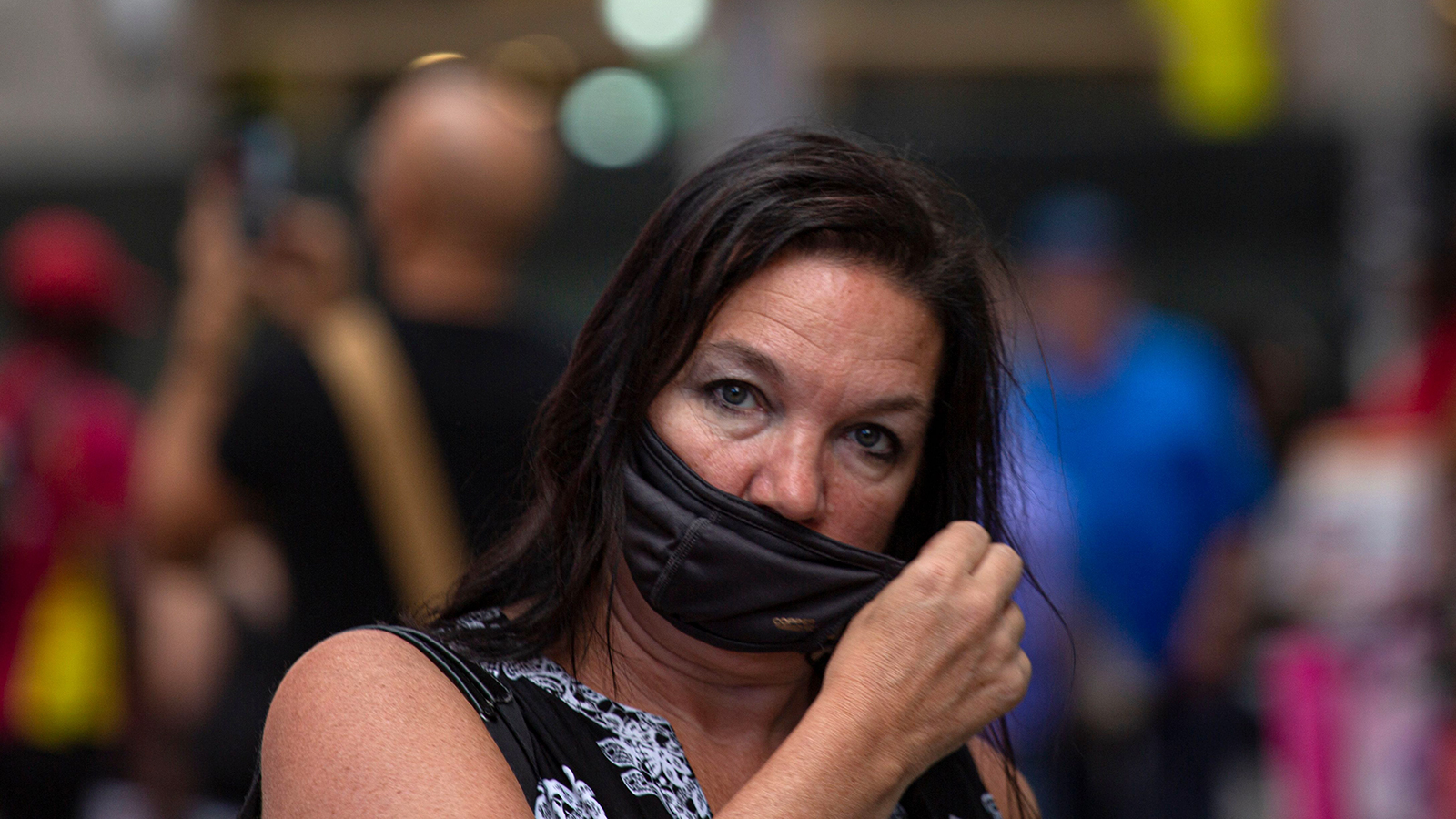 A woman wears a mask in Midtown Manhattan in New York on July 29.