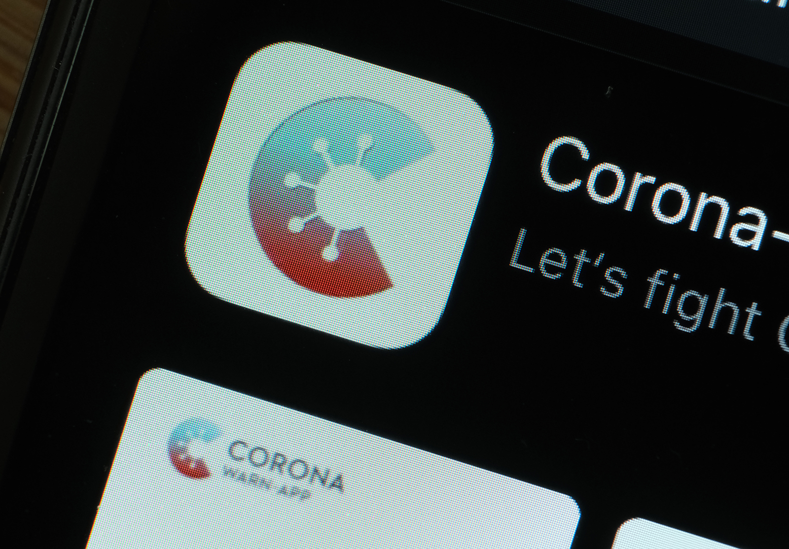 The newly-released "Corona-Warn-App" developed by the German government for tracking Covid-19 infections is seen for download on an Apple iPhone on June 16, in Berlin, Germany. 