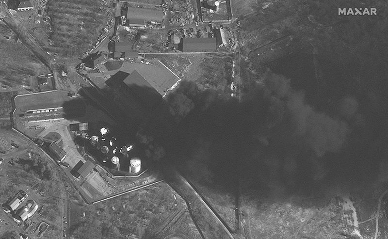 Fuel storage tanks are seen on fire at the Russian-controlled Antonov Airbase in Hostomel,Ukraine.