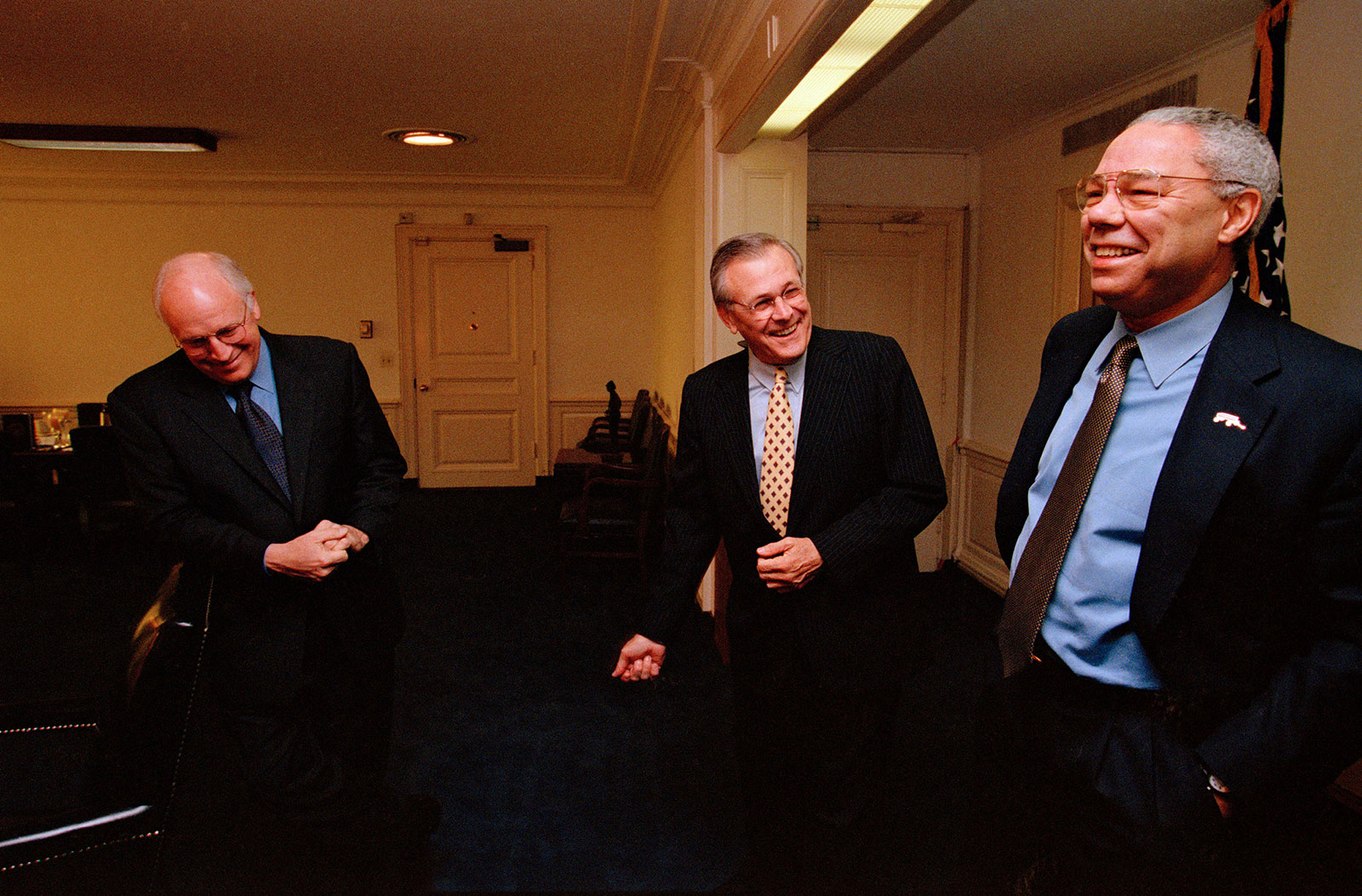 From left, former Vice President Dick Cheney, former Defense Secretary Donald Rumsfeld and former Secretary of State Colin Powell share a laugh in Rumsfeld's office in April 2001.