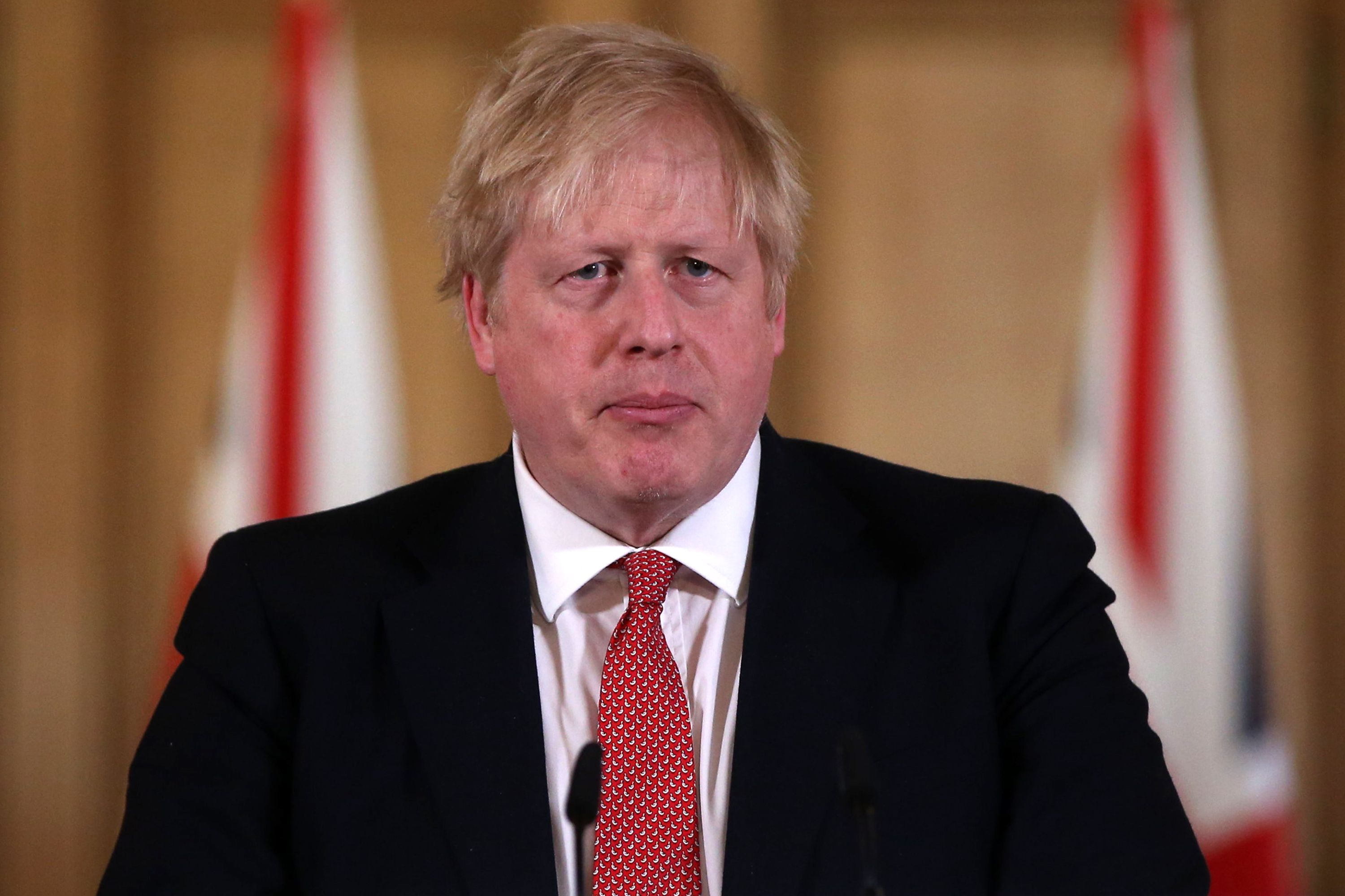 British Prime Minister Boris Johnson speaks about the government's response to the novel coronavirus outbreak during a news conference at 10 Downing Street on March 22.