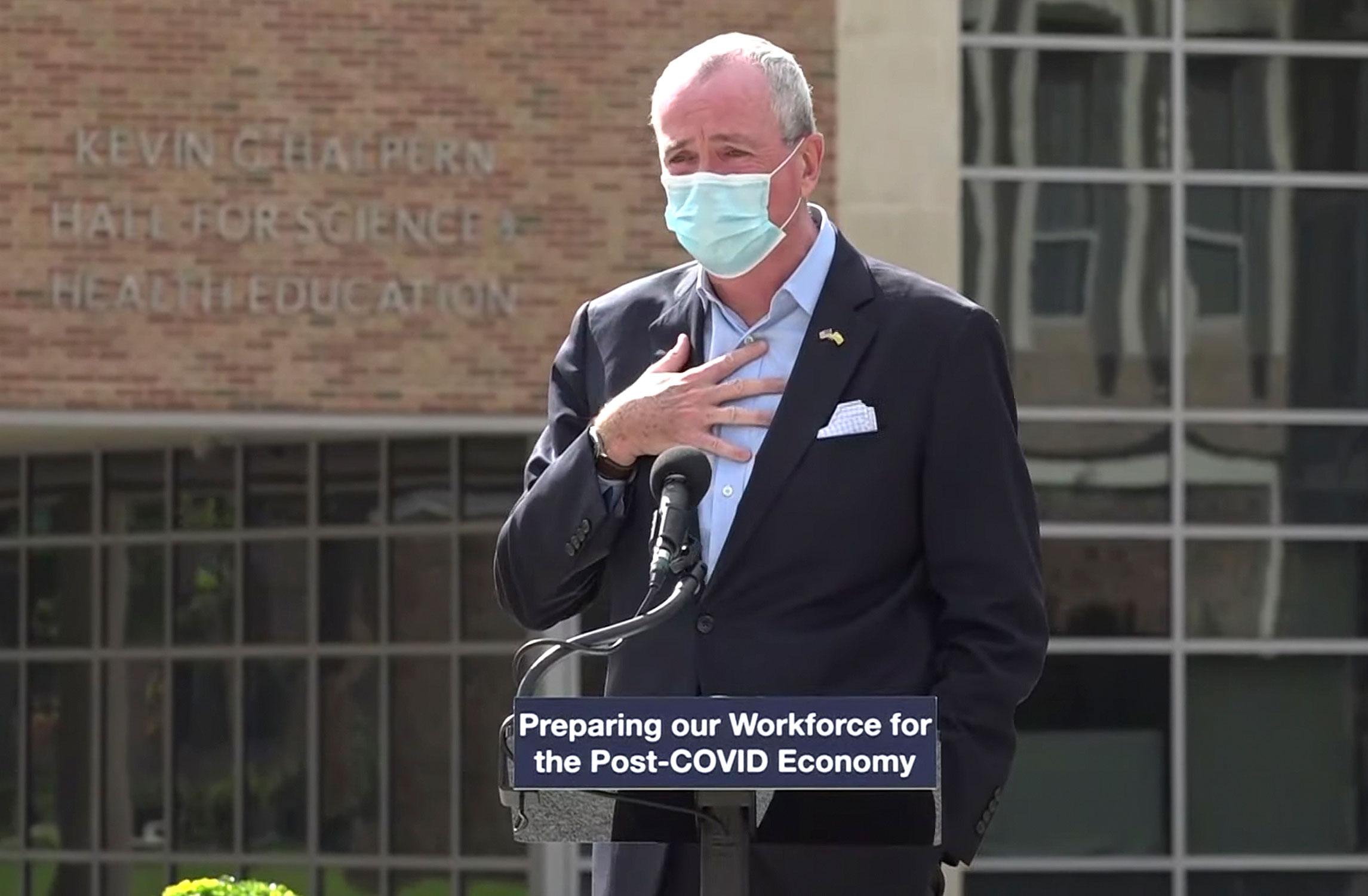 Gov. Phil Murphy speaks at an event on October 21 in Blackwood, New Jersey. He told attendees that he must leave the event after just finding out that he'd been in contact with someone who had tested positive for Covid-19.