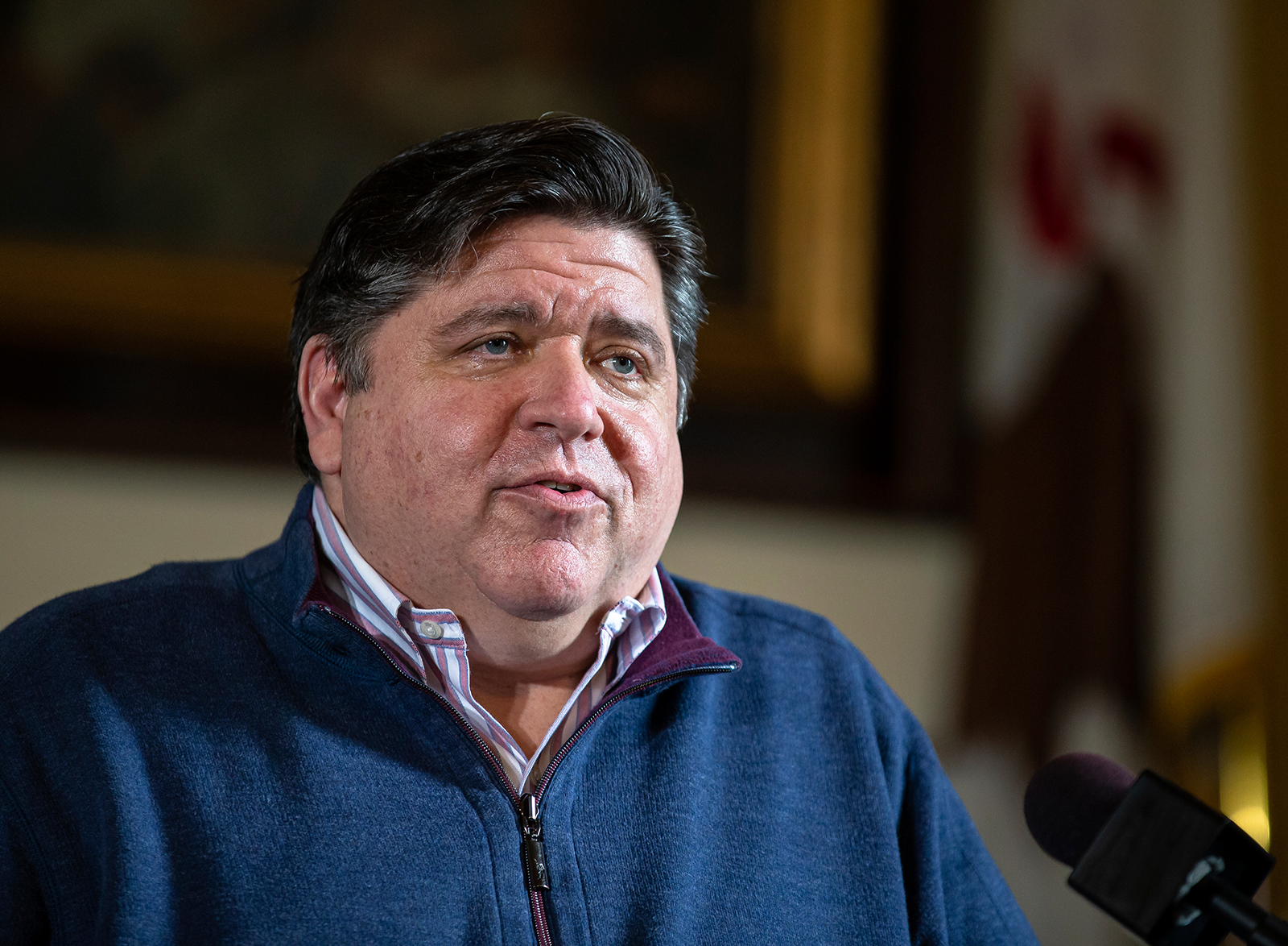Gov. JB Pritzker answers questions during his daily press briefing on the COVID-19 pandemic held in his office at the Illinois State Capitol, in Springfield, on  May 21.