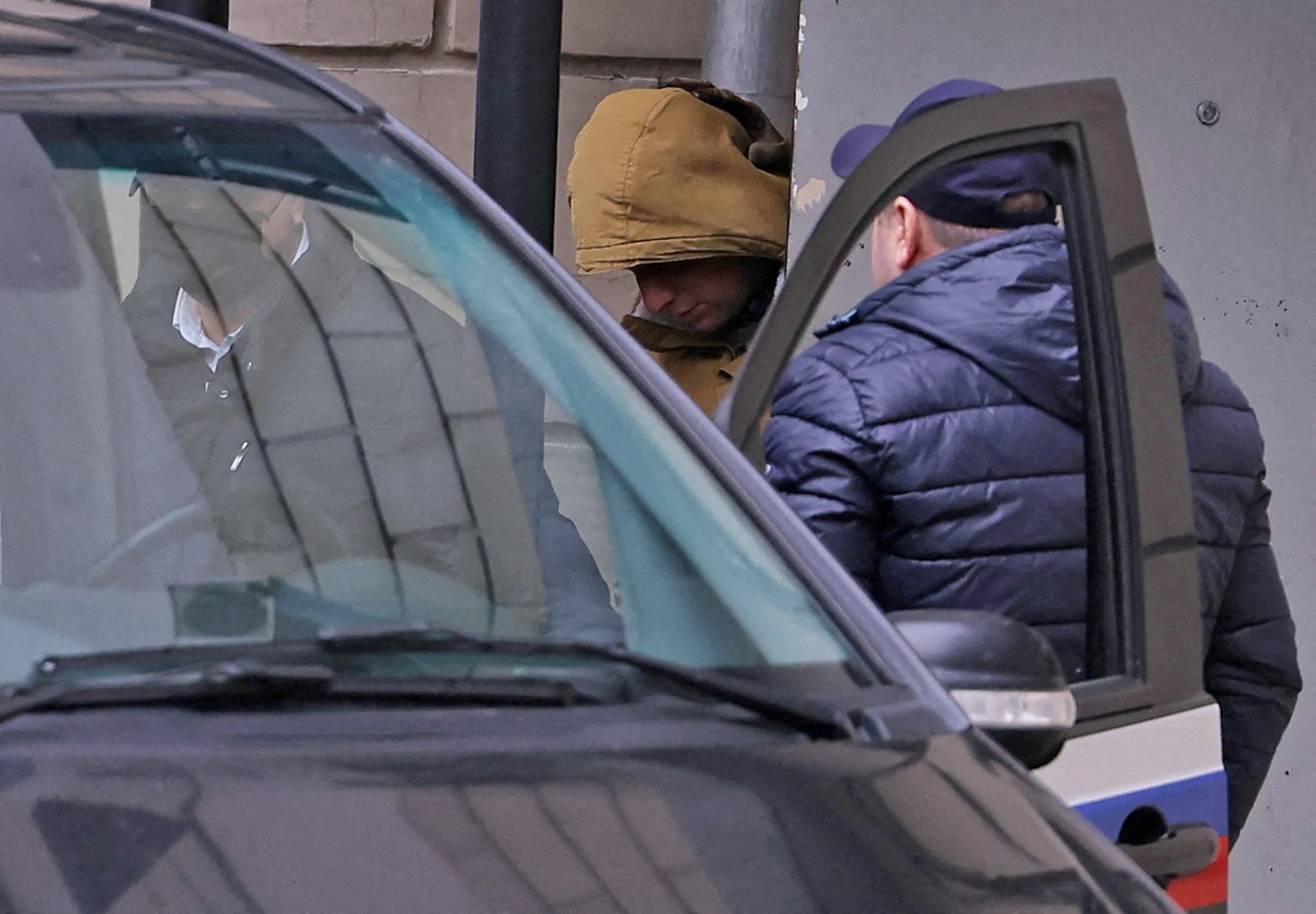 Reporter for U.S. newspaper The Wall Street Journal Evan Gershkovich, detained on suspicion of espionage, leaves a court building in Moscow, Russia, on March 30.