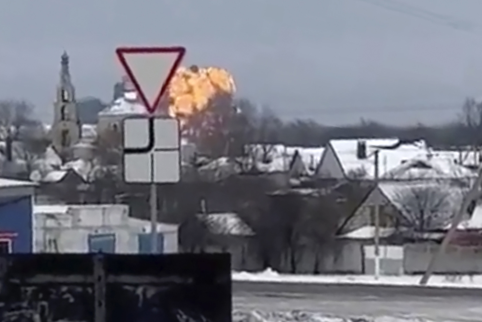 A screengrab taken from video posted to social media shows flames rising from the scene of a plane crash near Yablonovo, in Russia's Belgorod region, on Wednesday, January 24. 