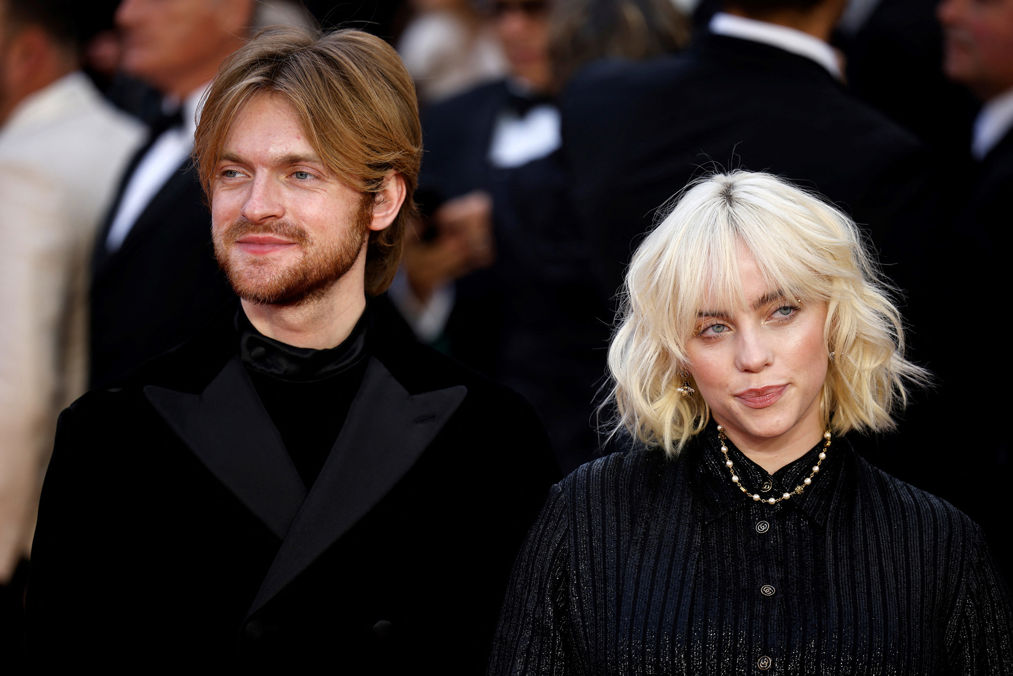 Finneas O'Connell, left, and Billie Eilish pose on the red carpet after arriving to attend the World Premiere of "No Time to Die" at the Royal Albert Hall in London on September 28, 2021.