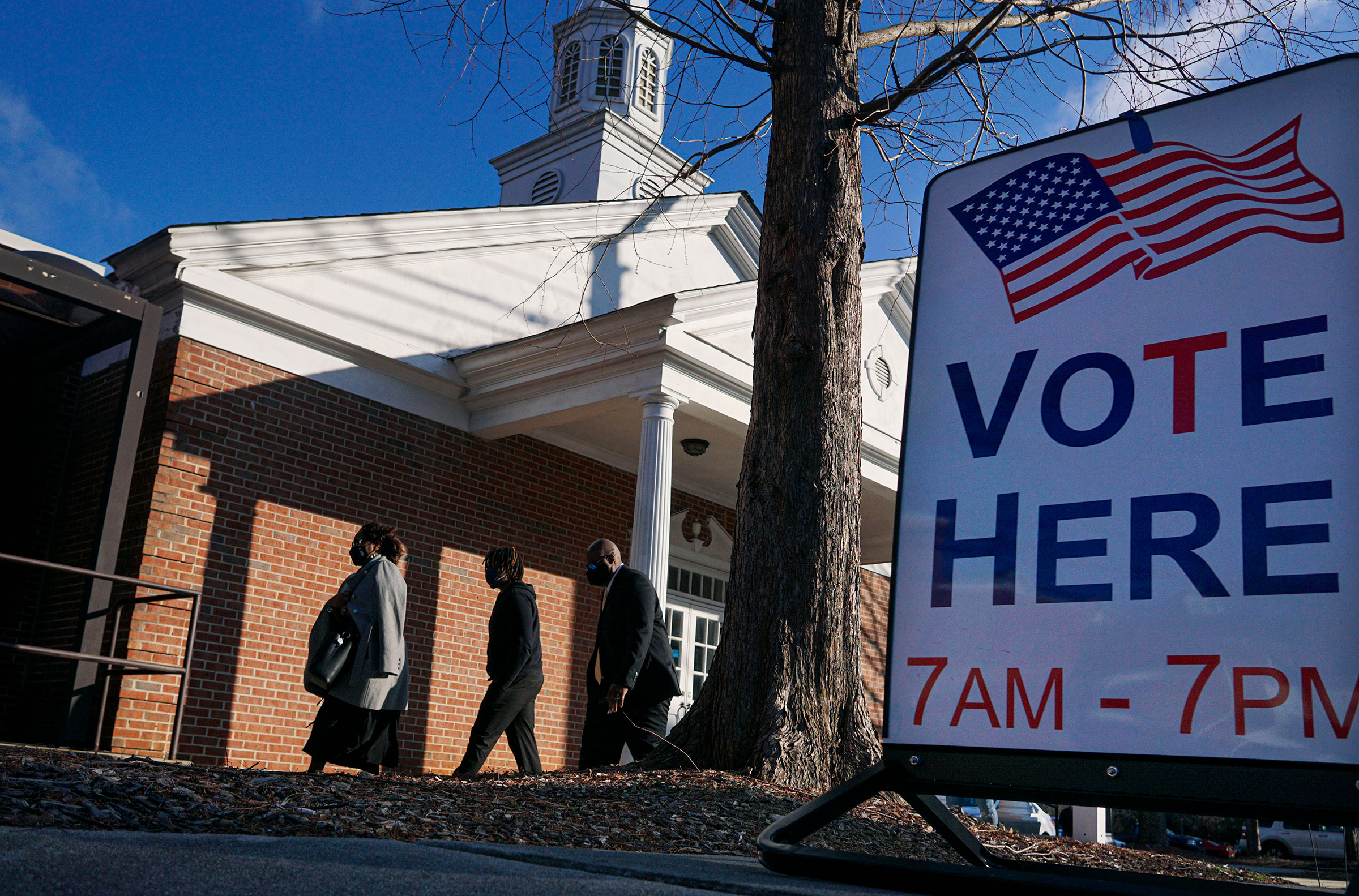 Voters enter a polling station at the Zion Baptist Church on January 5 in Marietta, Georgia. 