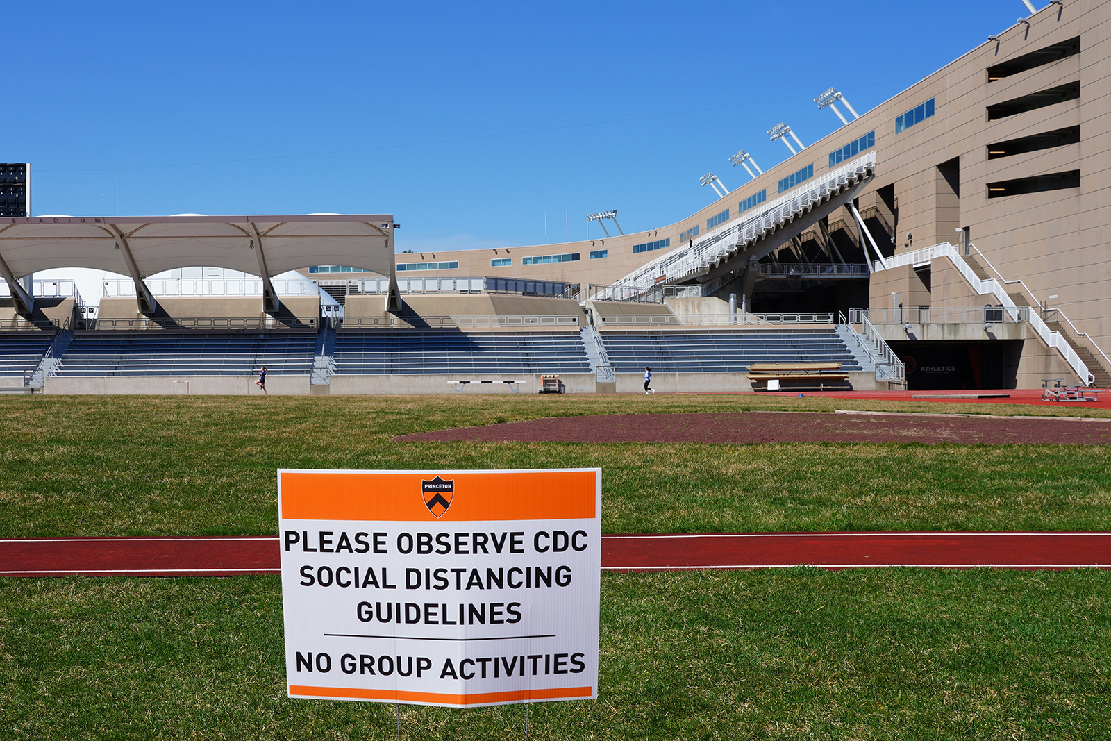 A sign warns the public about social distancing in the wake of Covid-19 on the campus of Princeton University, New Jersey, on March 26. 