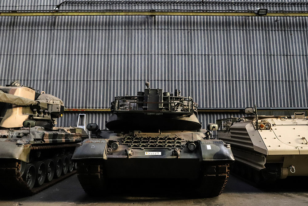 A German-made Leopard 1 tank, center, at an OIP Land Systems SA hangar in Tournai, Belgium, on Wednesday, March 15. Ukrainian Defense Minister Oleksii Reznikov said his country had received Leopard 2 and Challenger tanks and was expecting Leopard 1 tanks “a little later.”