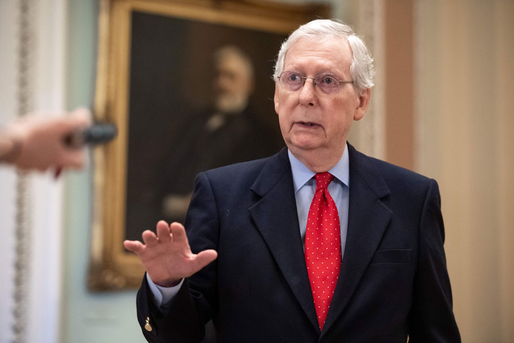 Senat Majority Leader Mitch McConnell speaks to reporters after leaving the Senate floor at the US Capitol in Washington on April 9. 