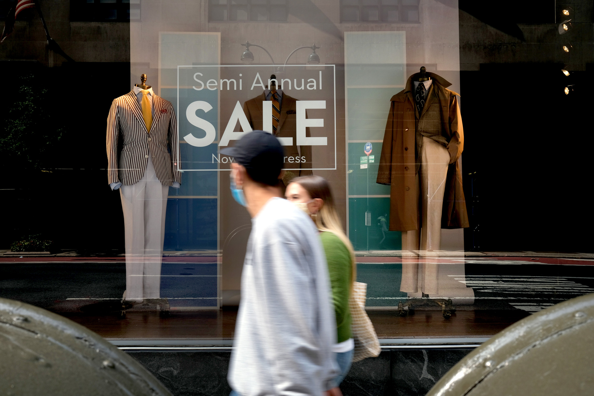 Men's business attire is displayed in the window of a Manhattan clothier on September 15 in New York City. 