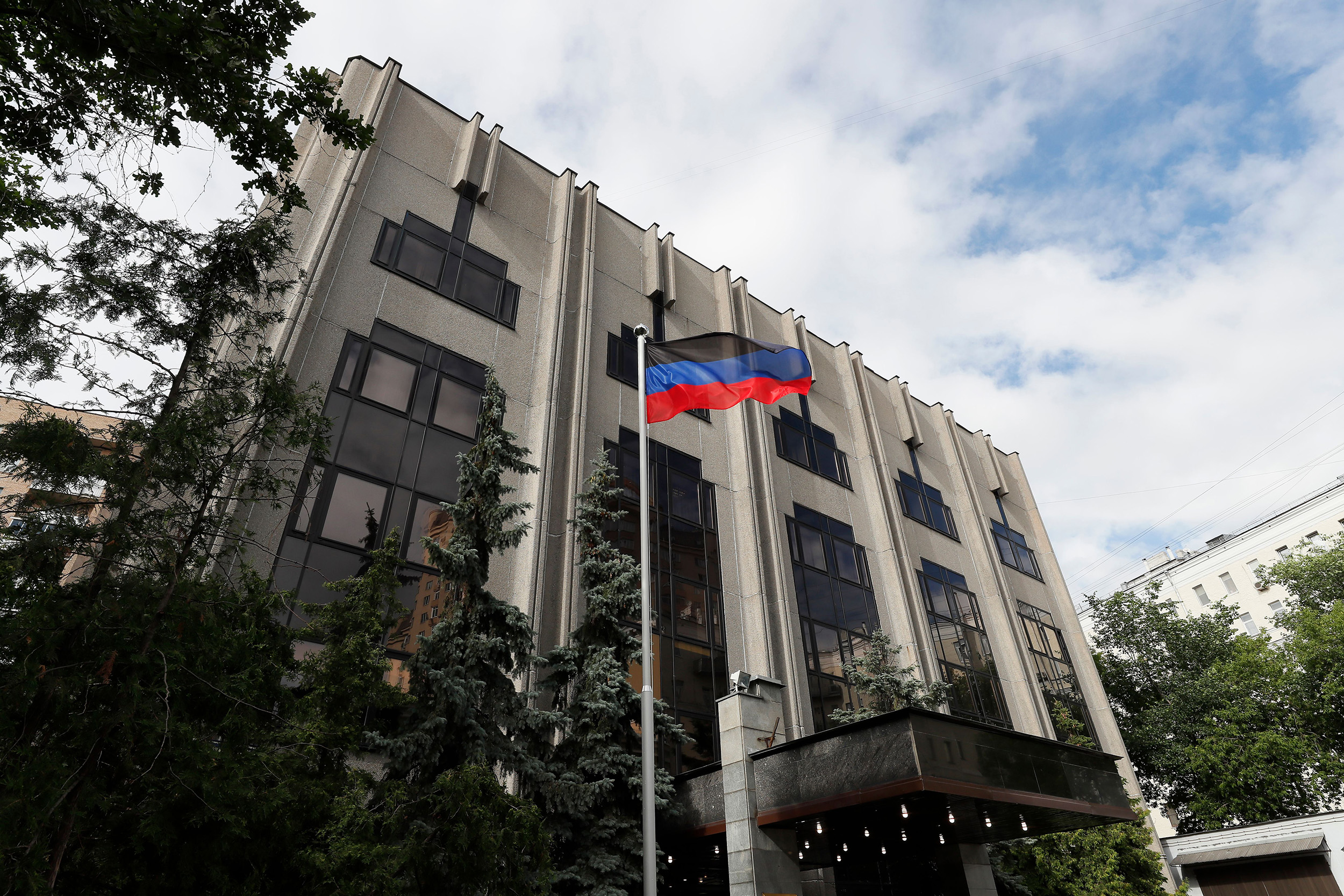 The flag of the self-proclaimed Donetsk People's Republic (DPR) on display outside the embassy following the official opening in Moscow on July 12.