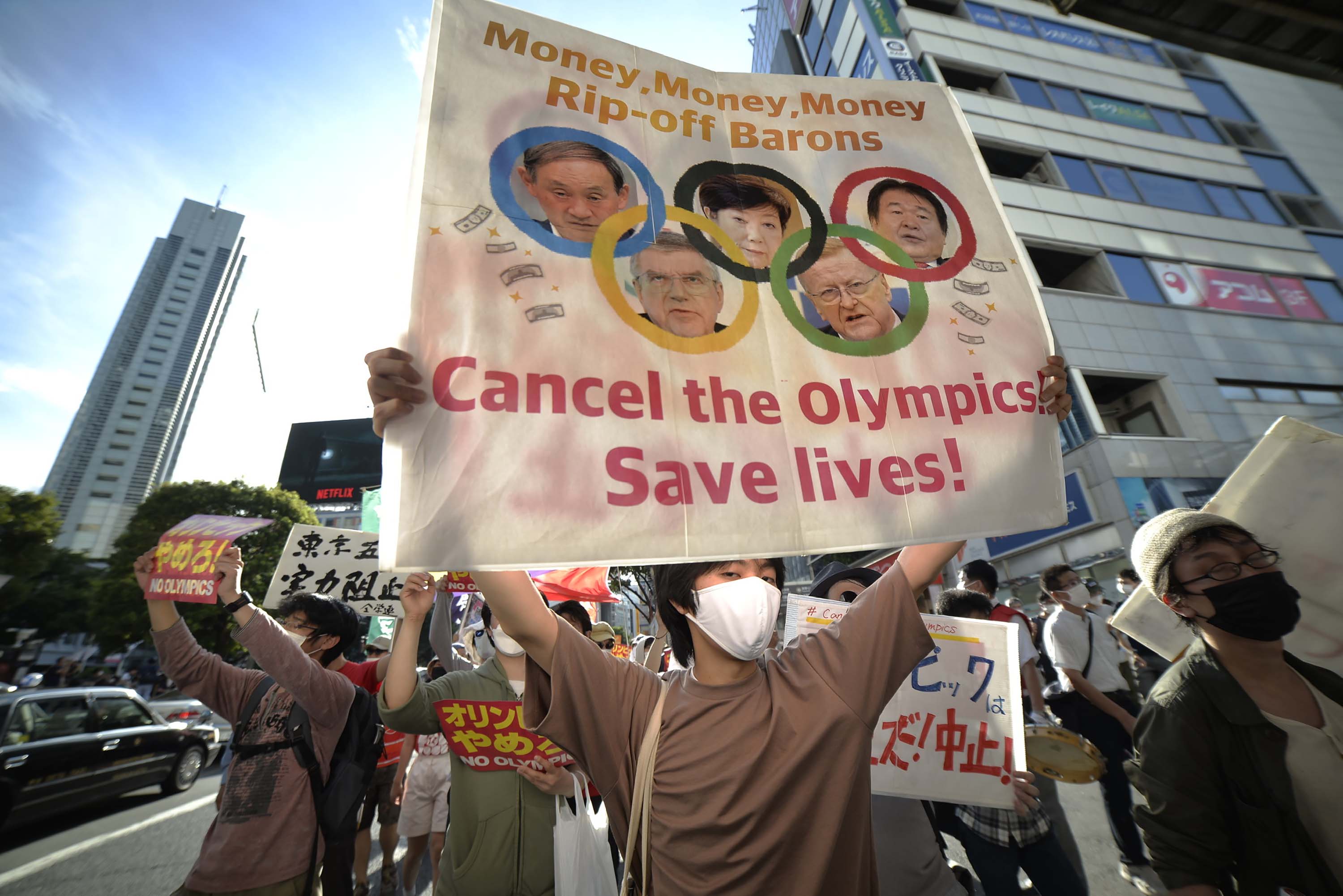 People protest ahead of the Opening Ceremony of the 2020 Tokyo Summer Olympics on July 23, in Tokyo, Japan.