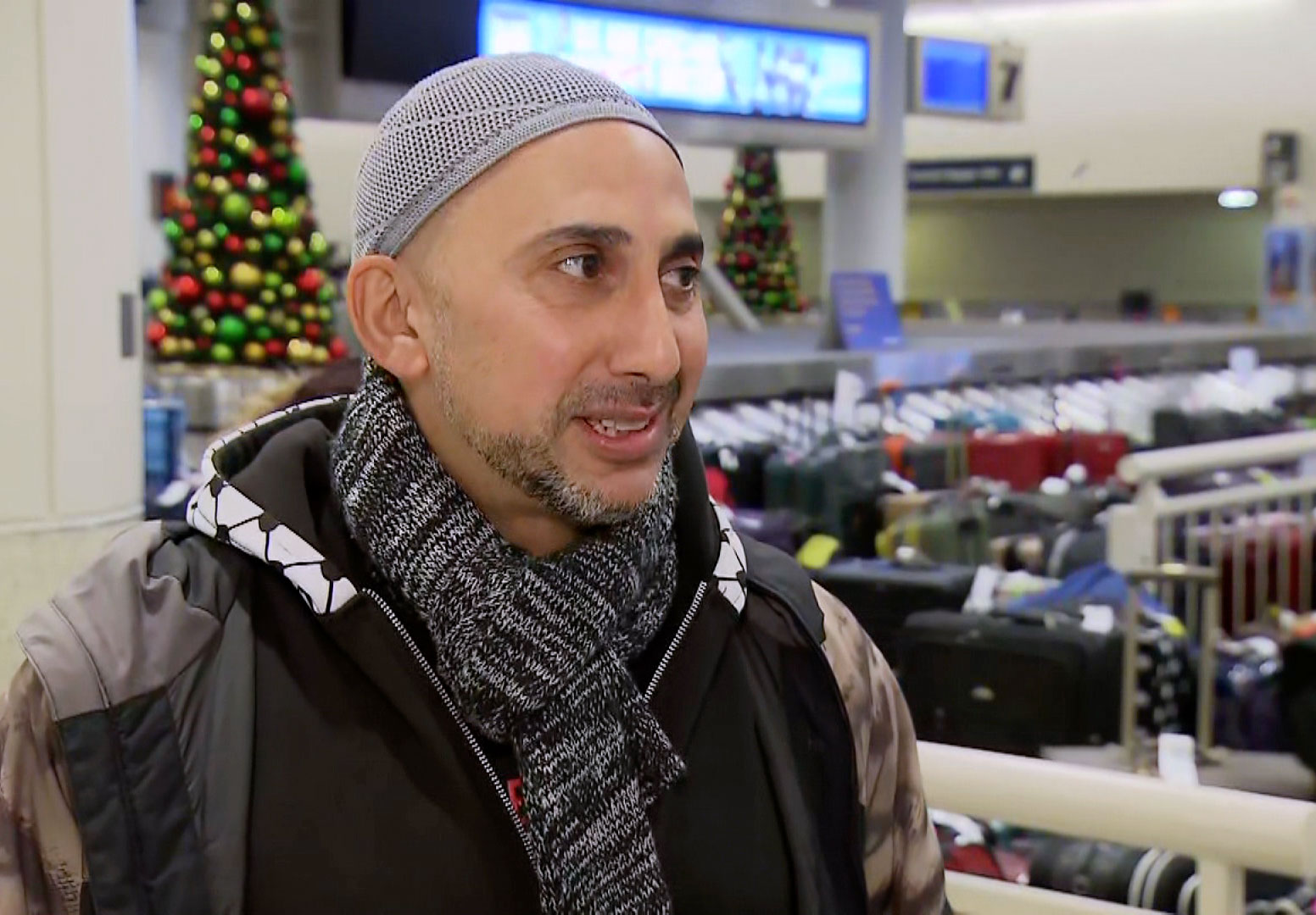 Southwest flyer Rami Nashashibi speaks to CNN on Tuesday at Chicago's Midway International Airport.