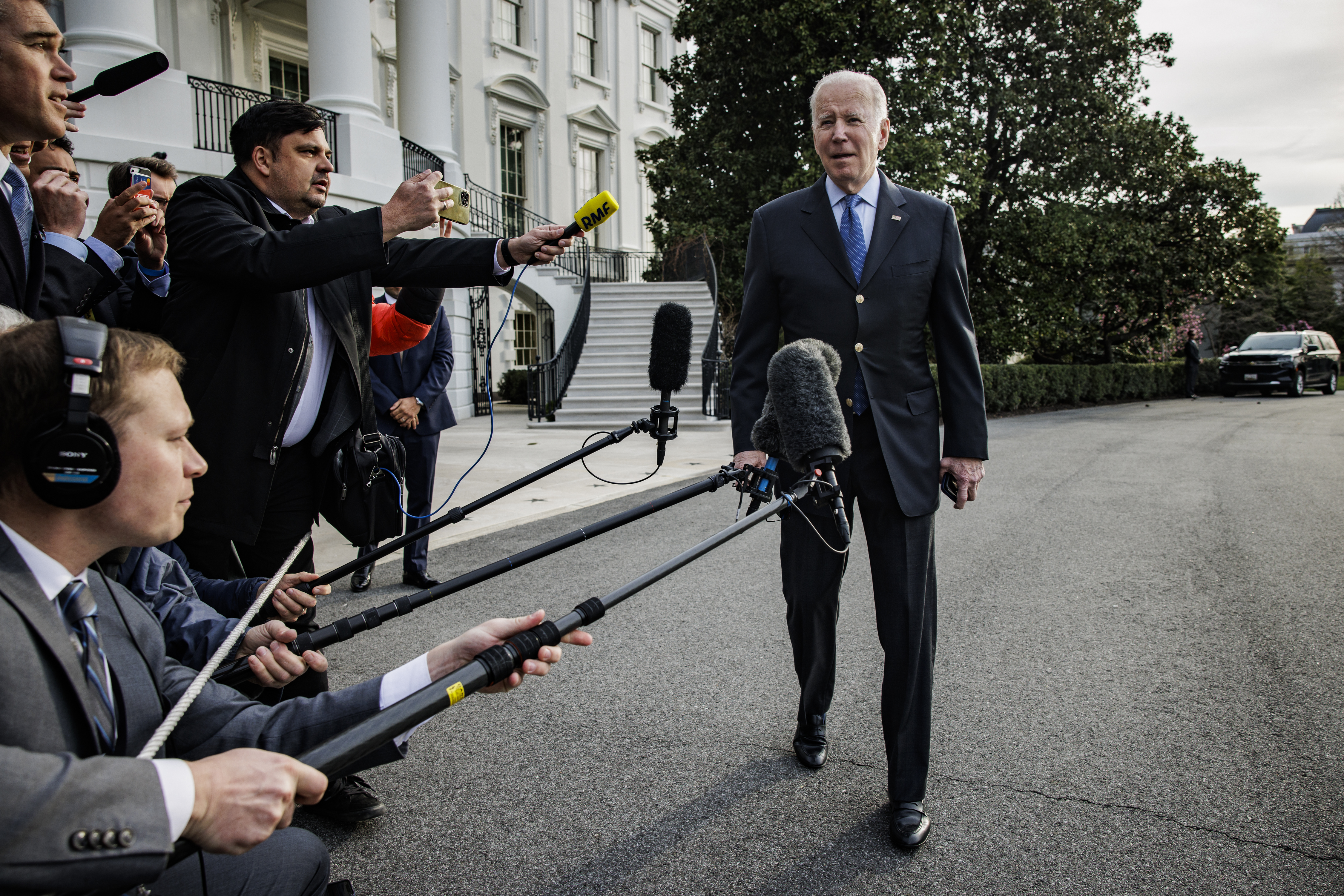 US President Joe Biden speaks to the media on the South Lawn of the White House before boarding Marine One in Washington, on Wednesday, March 23. 