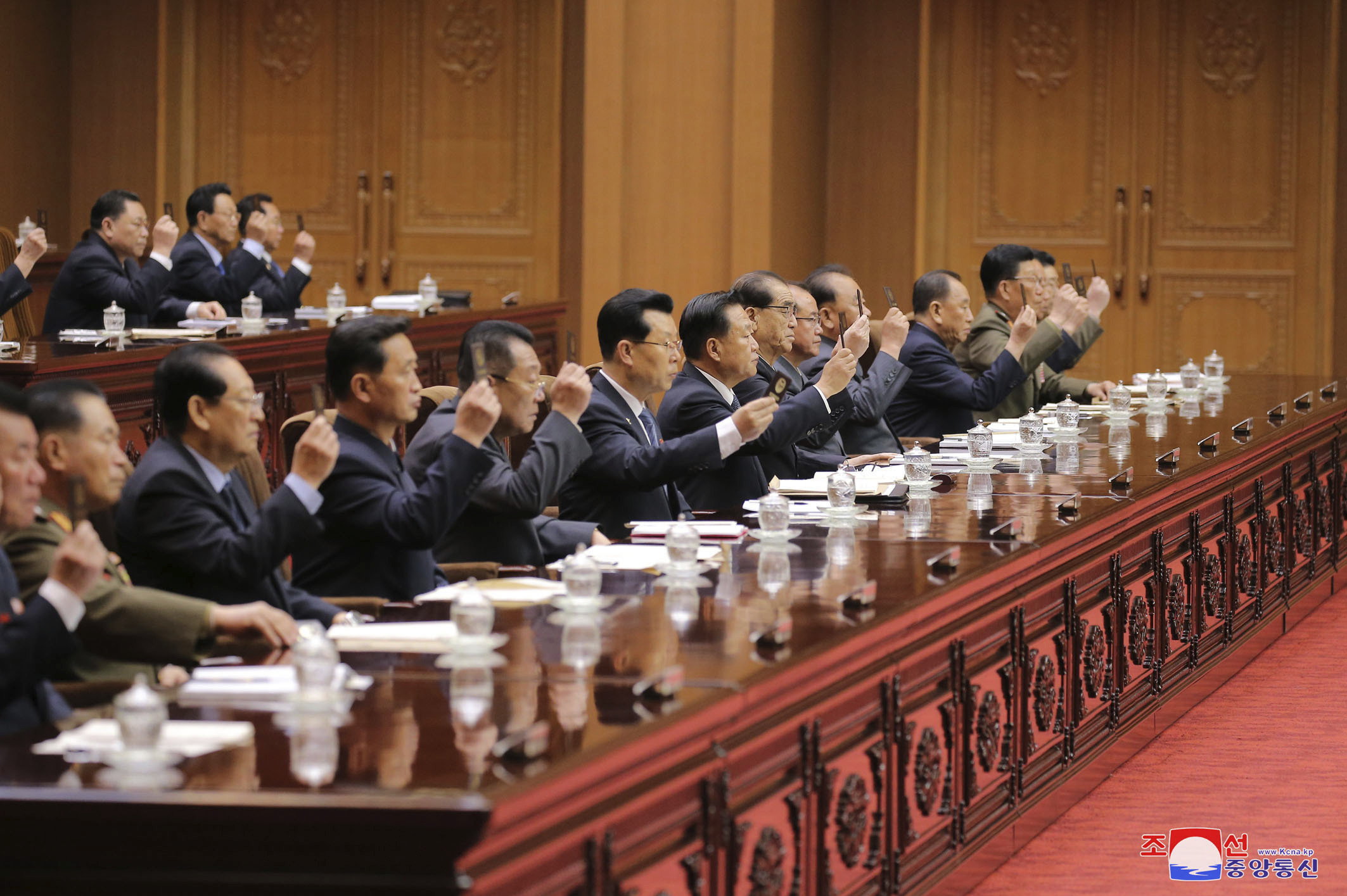 This April 12 photo, provided by the North Korean government on April 13, shows a session of North Korea's parliament in Pyongyang. Independent journalists were not given access to cover the event depicted in this image, and the content of this image is as provided and cannot be independently verified.