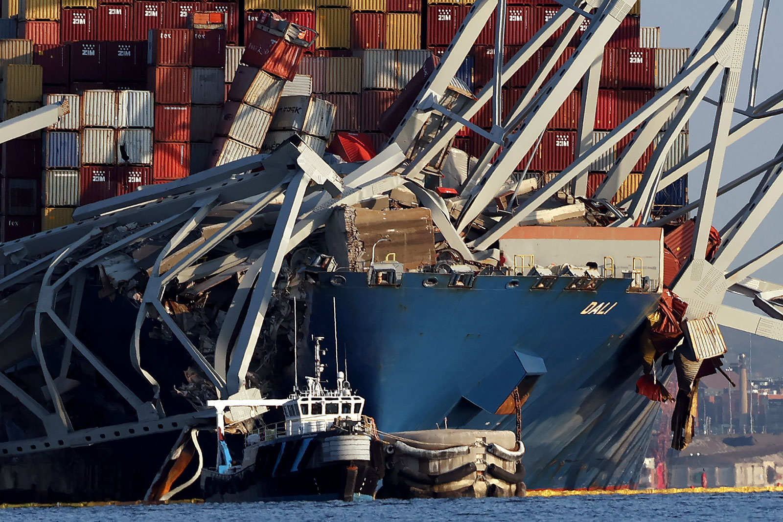 Crushed shipping containers are seen on the bow of the Dali on Friday in Baltimore. 