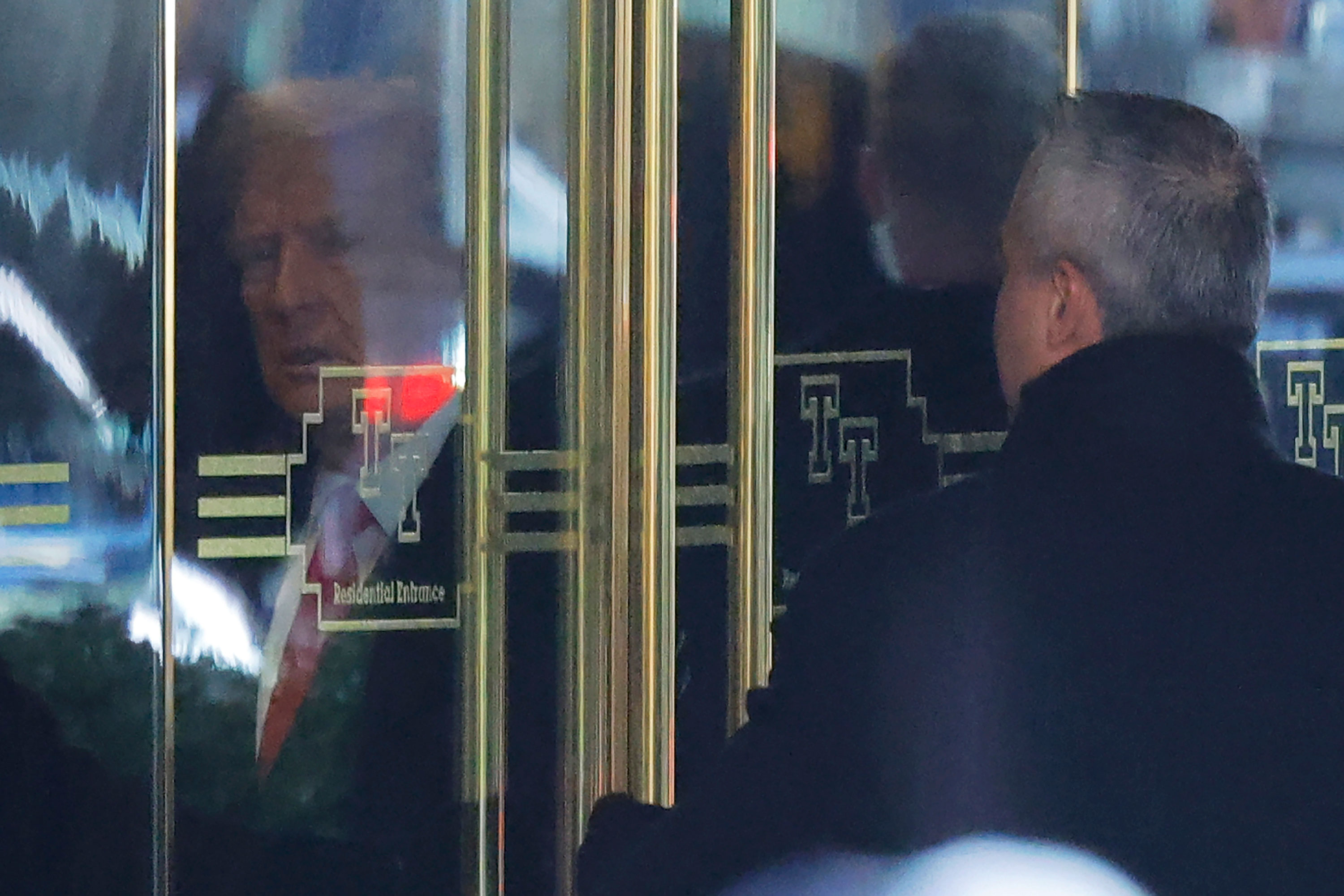 Former President Donald Trump departs Trump Tower in New York for a Manhattan criminal court on Monday morning.