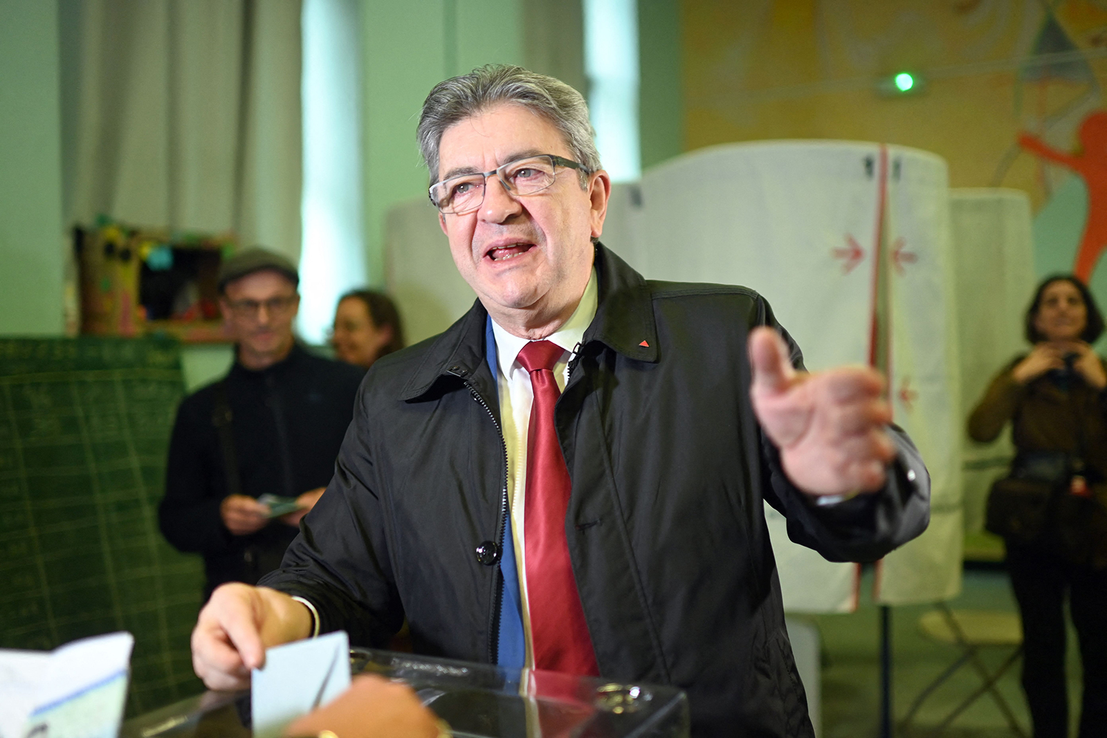France's leftist movement La France Insoumise party leader and former candidate for the 2022 presidential election Jean-Luc Melenchon casts his vote during the second round of France's presidential election at a polling station in Marseille, southern France, on April 24.