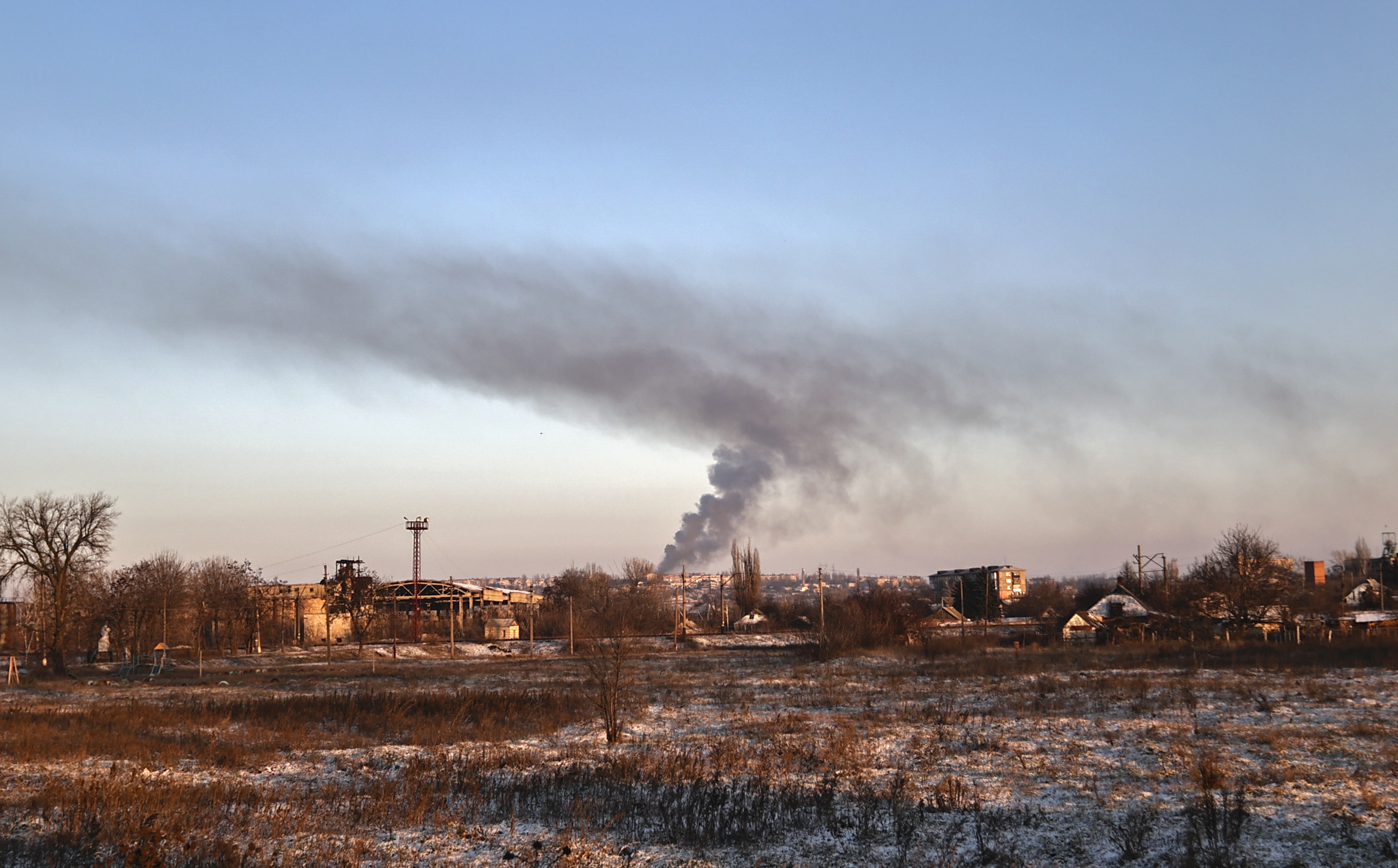 Smoke rises after shelling in Soledar, the site of heavy battles with Russian forces in the Donetsk region, on Sunday.