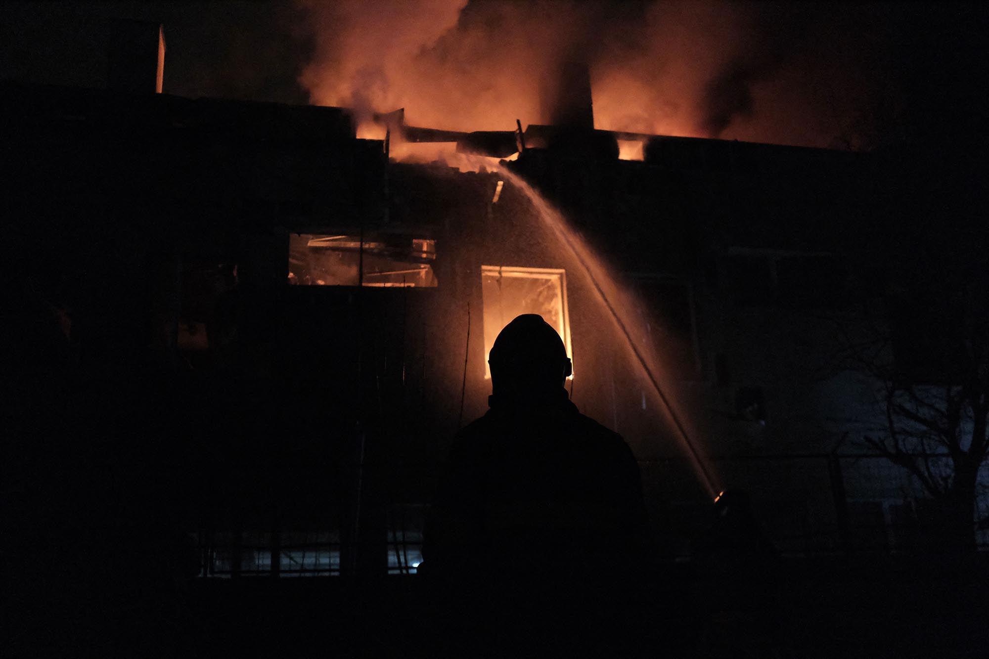 Firefighters extinguish a fire in a building materials store in the Ukrainian capital, Kyiv, on March 28. 