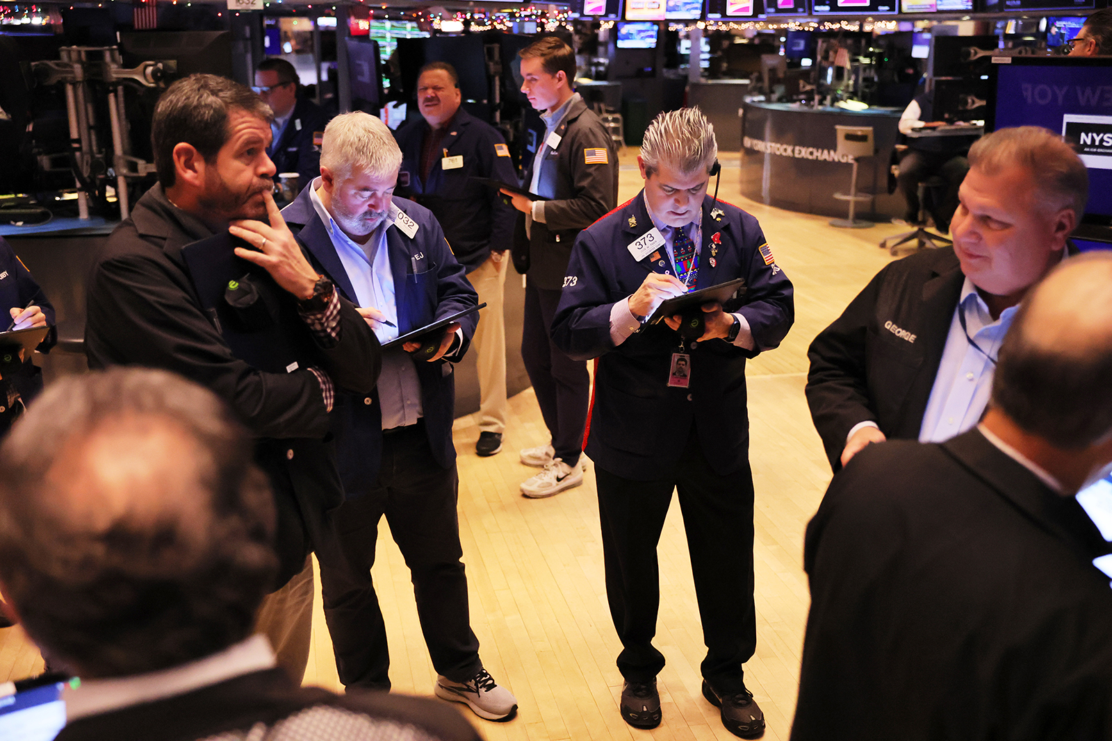 Traders at the New York Stock Exchange today.
