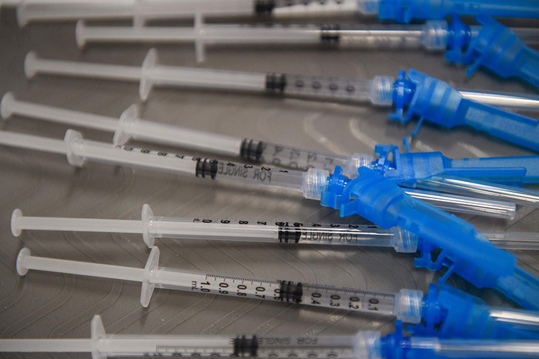 Syringes with doses of the Johnson & Johnson Covid-19 vaccine await recipients at a vaccination site at Baldwin Hills Crenshaw Plaza on March 11, in Los Angeles. 