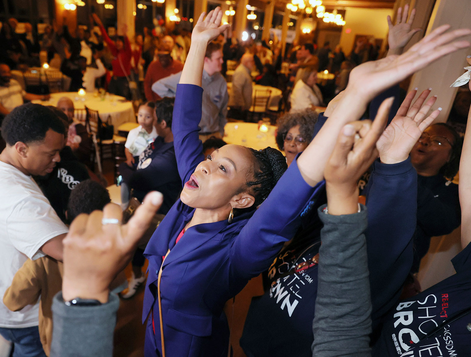 Rep. Shontel Brown dances to DJ Khaled's "All I Do Is Win" during her watch party on primary night, Tuesday, May 3, in Cleveland, Ohio.