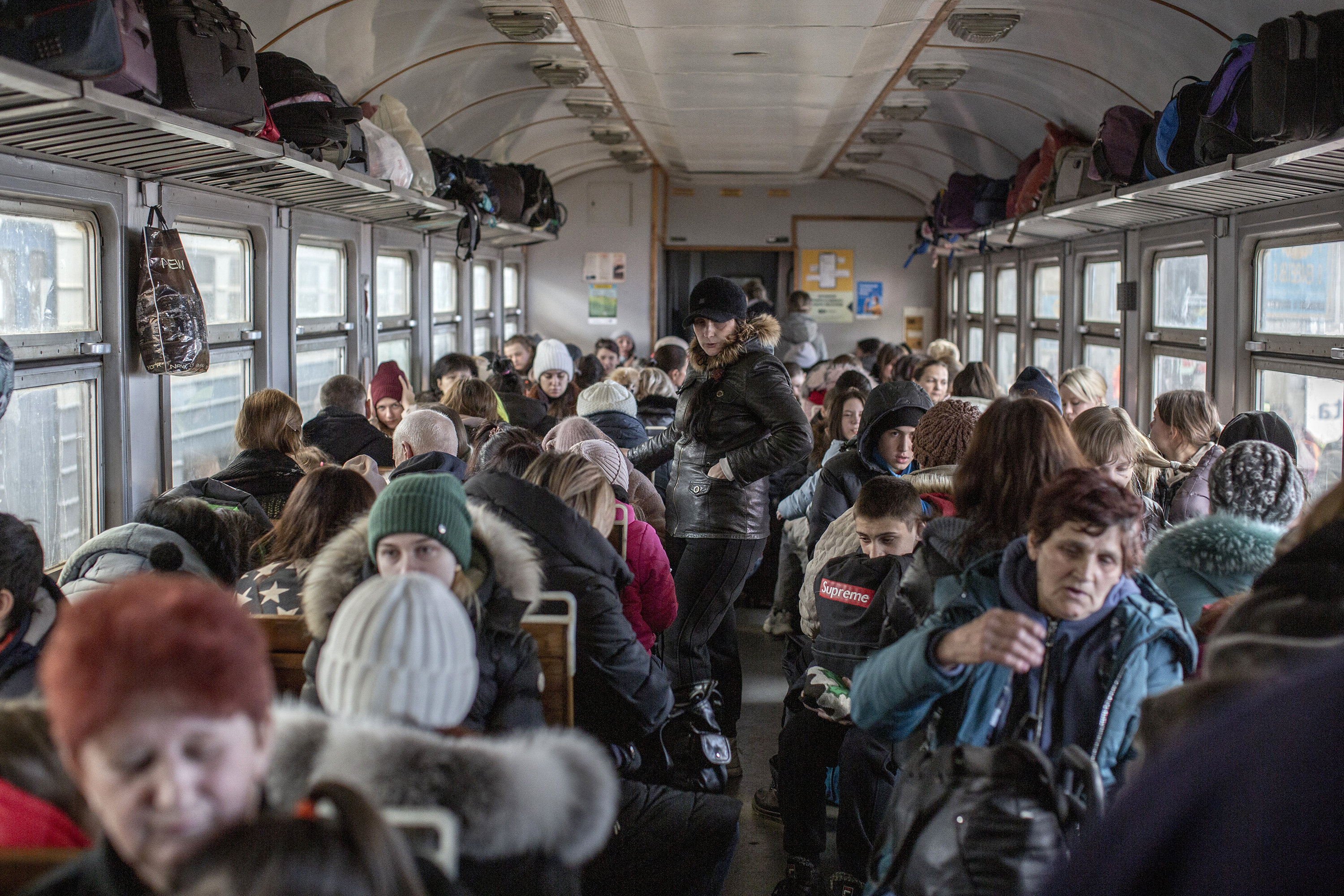 Displaced Ukrainians wait in the train station as they flee from the war in Lviv, Ukraine on March 15. 