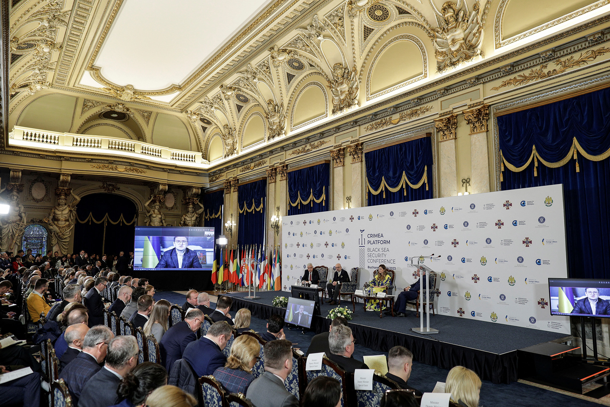 Ukrainian Foreign Minister Dmytro Kuleba delivers a remote address via video link during the First Black Sea Security Conference in Bucharest, Romania, on April 13.