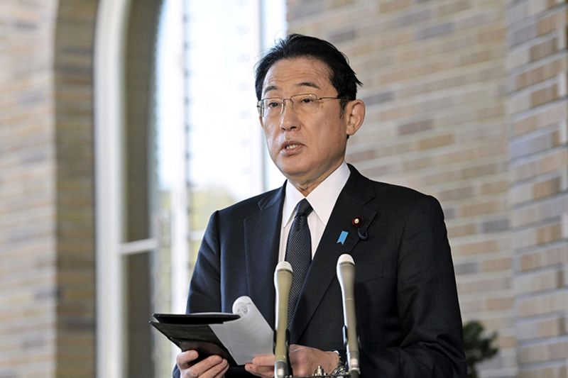 Japan's Prime Minister Fumio Kishida announces Japan's decision to impose sanctions on Russia over its actions in Ukraine, at his residence in Tokyo on Wednesday.