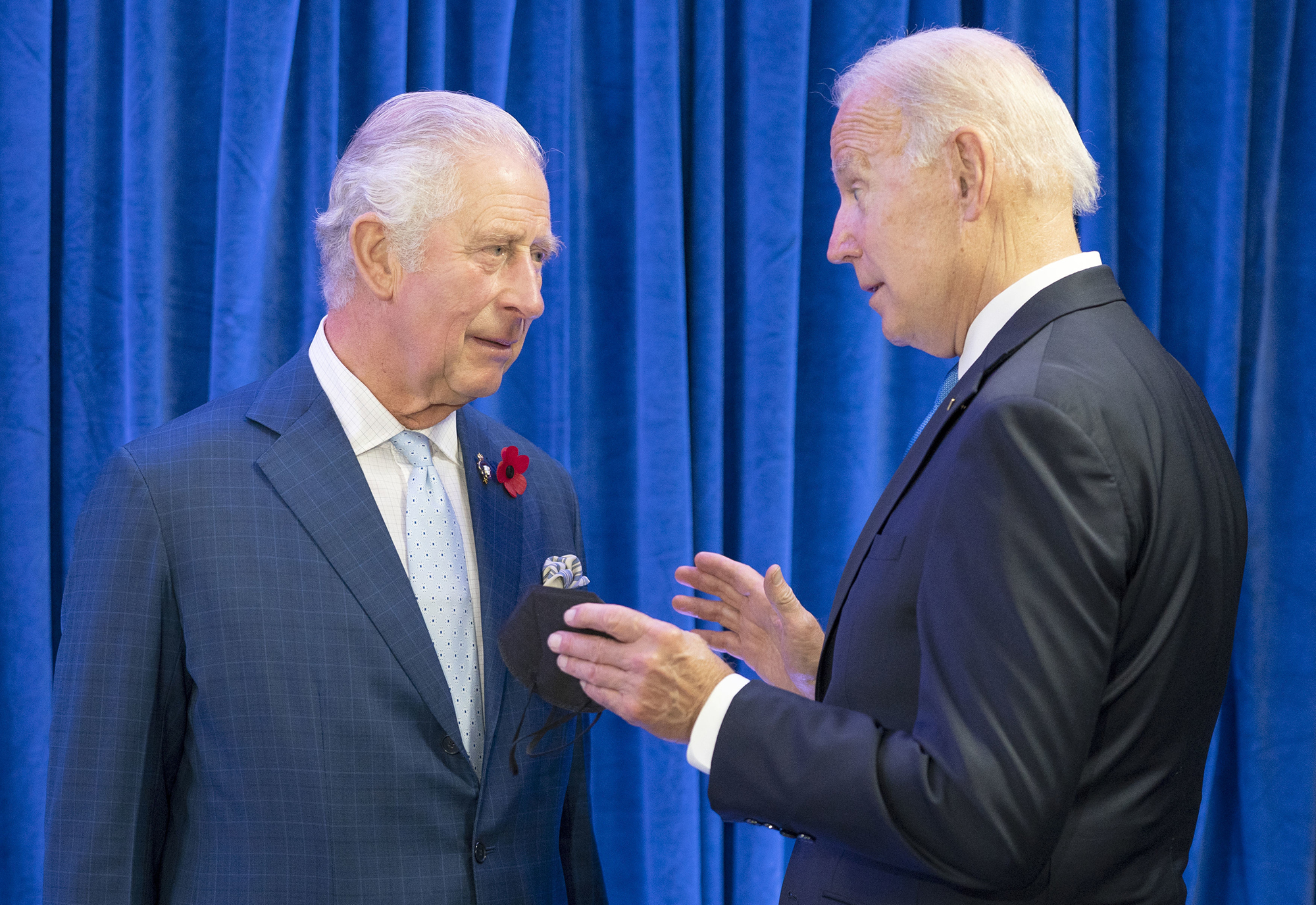 Britain's Prince Charles, left, greets U.S. President Joe Biden ahead of their bilateral meeting during the Cop26 summit at the Scottish Event Campus in Glasgow, Scotland, Tuesday, Nov. 2, 2021. 