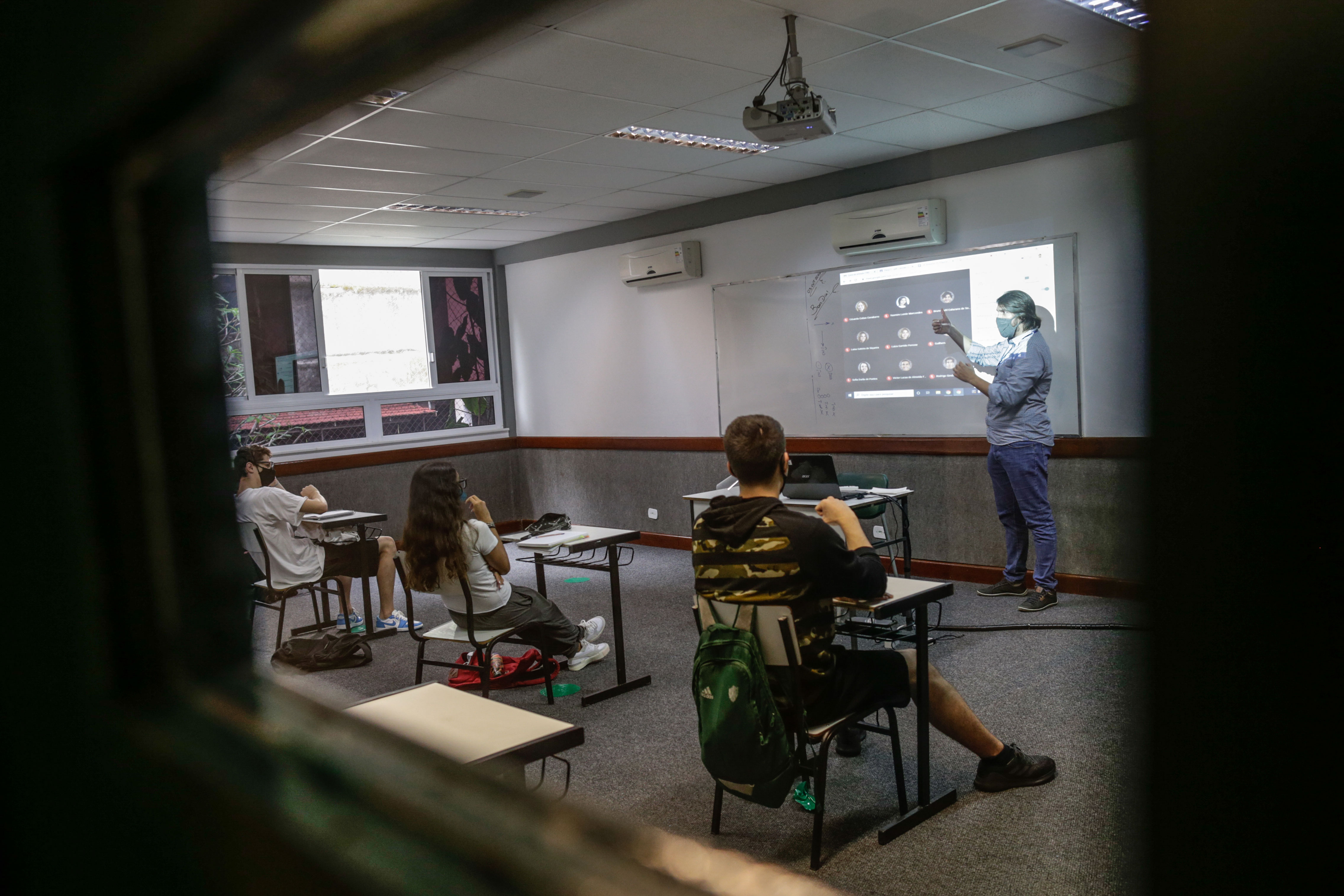 A teacher speaks during a class at a school in Rio de Janeiro in October 2020.