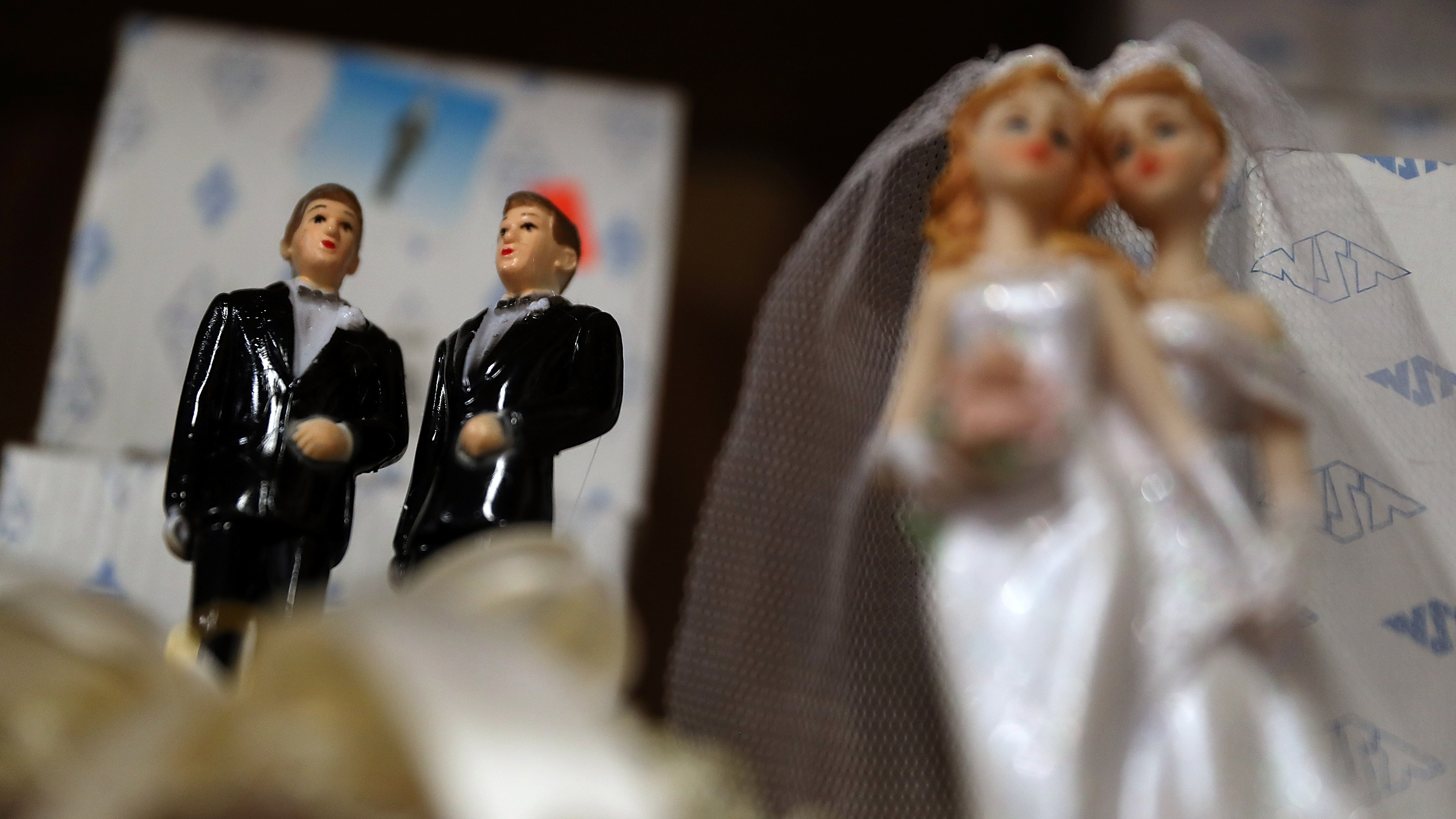 Same-sex marriage cake toppers are displayed on a shelf at Fantastico on December 5, 2017, in San Francisco, California.