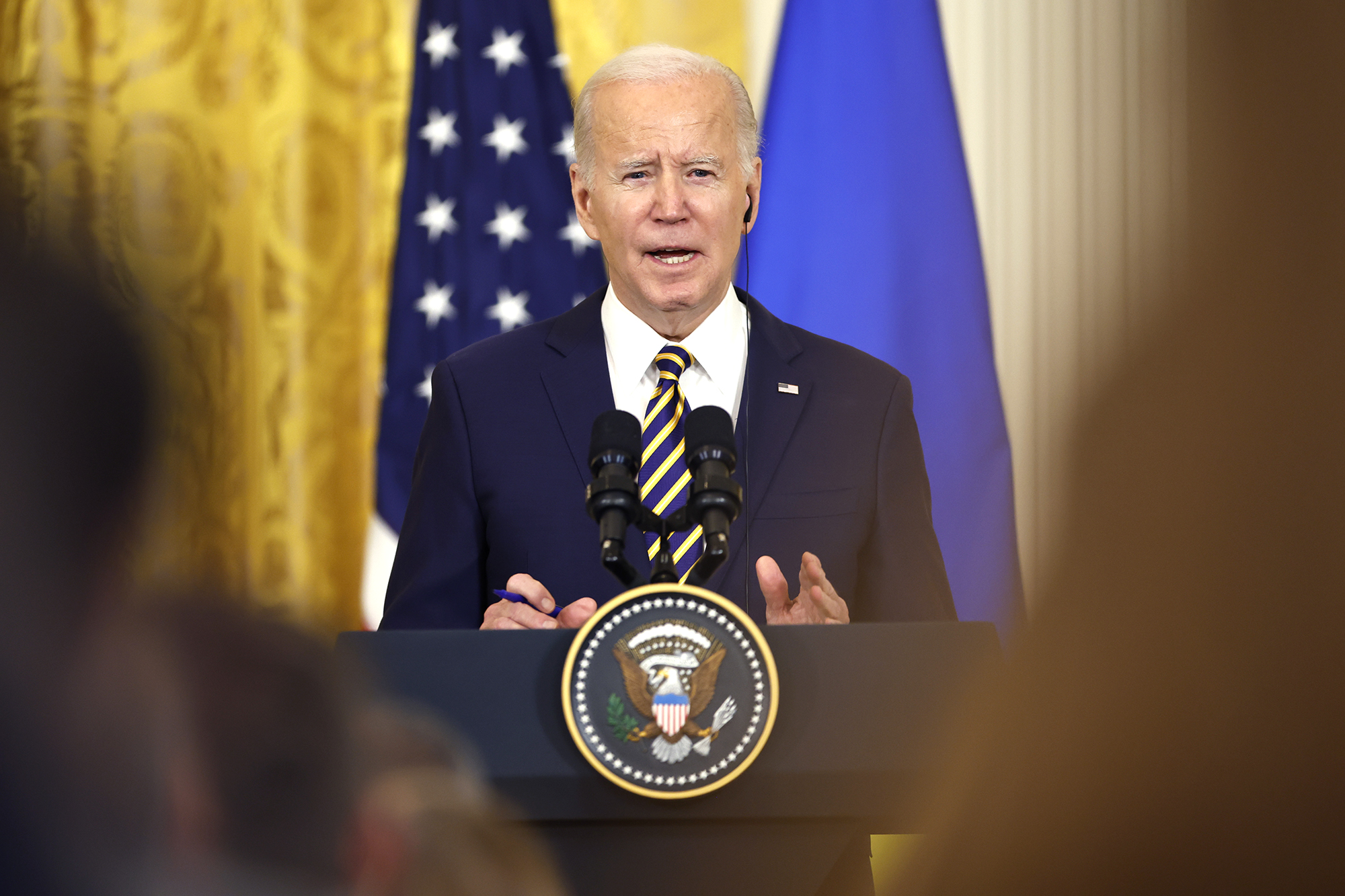 US President Joe Biden speaks during a news conference with Volodymyr Zelensky, in the East Room of the White House in Washington D.C., on December 21.