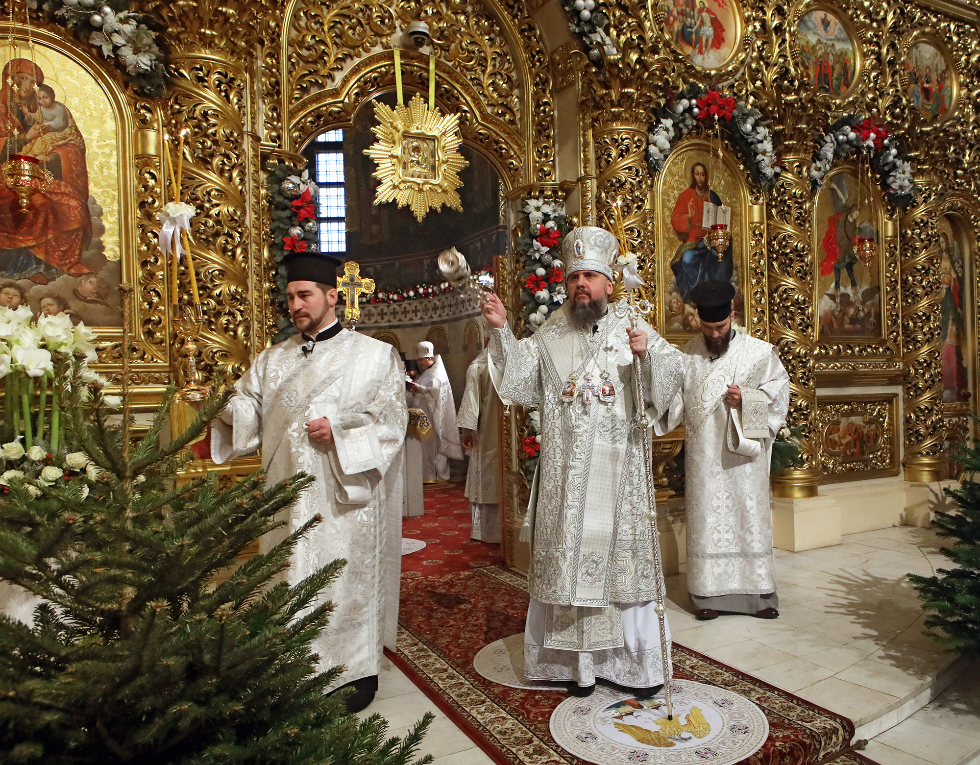 Primate of the Orthodox Church of Ukraine, Metropolitan of Kyiv and Ukraine Epifanii, center, heads the divine liturgy at St Michael's Golden-Domed Cathedral on Christmas, Kyiv, Ukraine, on January 7, 2021.