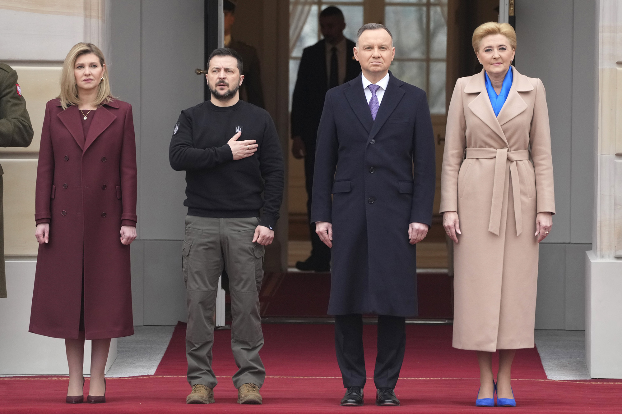 Poland's President Andrzej Duda, second right, with his wife Agata Kornhauser-Duda, right, welcomes Ukrainian President Volodymyr Zelensky, second left, with his wife Olena, left, as they meet at the Presidential Palace in Warsaw, Poland, on April 5.