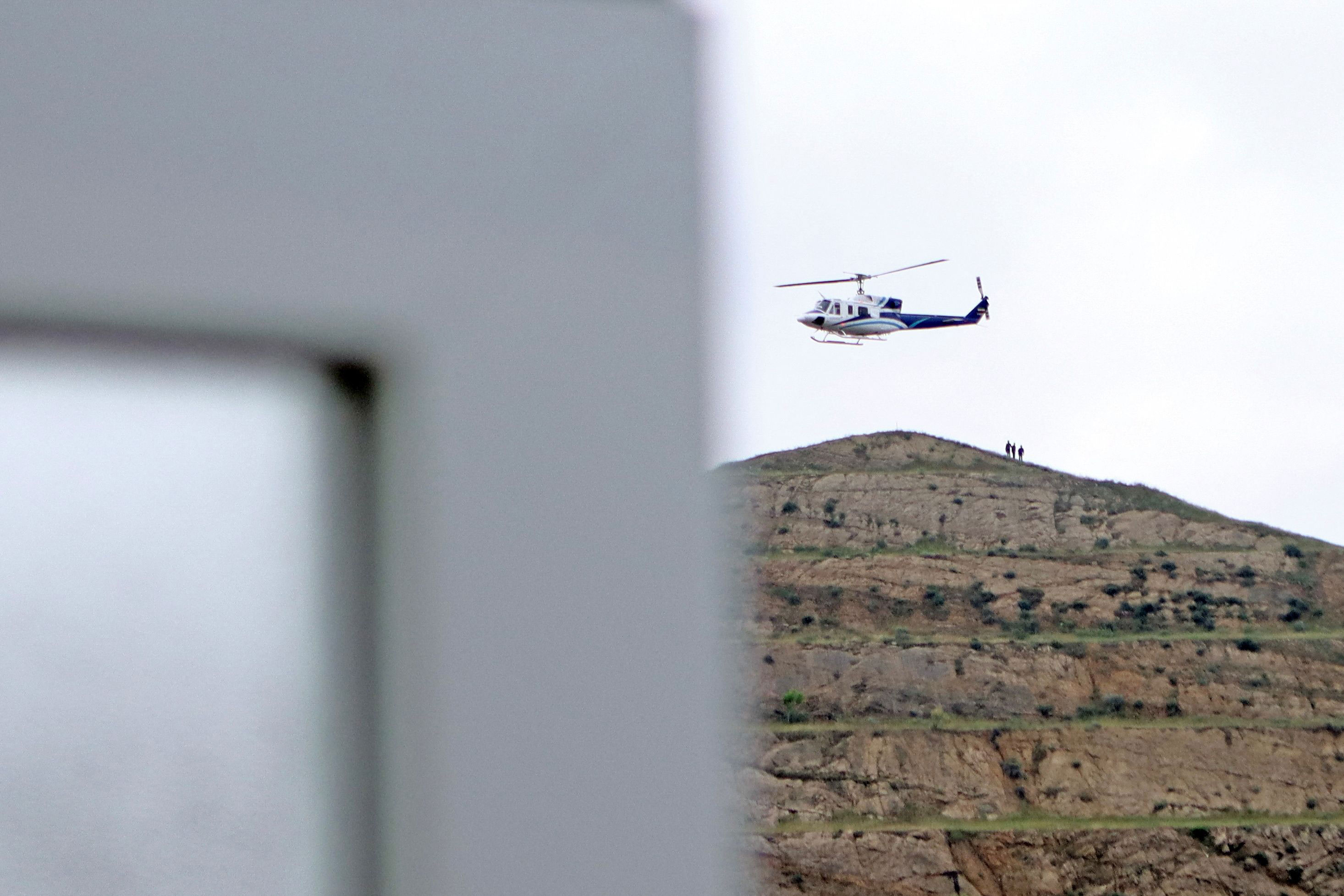 In this third-party photo provided by the Islamic Republic News Agency and West Asia News Agency, a helicopter carrying Iran's President Ebrahim Raisi takes off near the Iran-Azerbaijan border on May 19. 