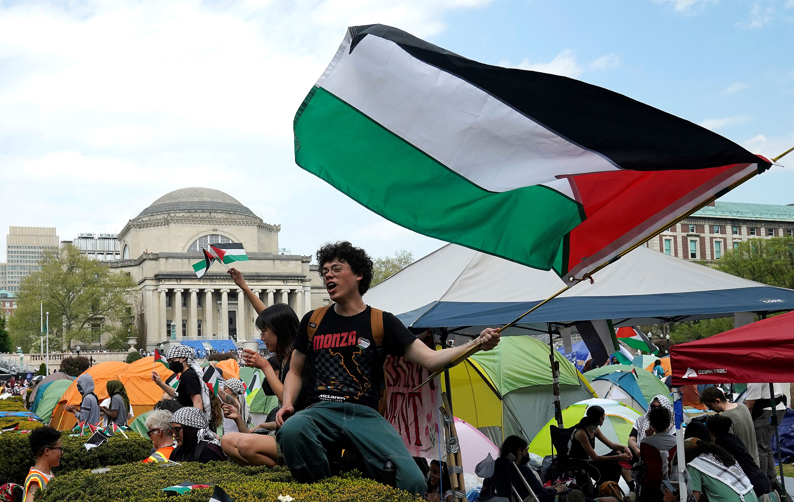 Protesters wave Palestinian flags on the West Lawn of Columbia University on April 29, 2024. Student demonstrators at Columbia University, the epicenter of pro-Palestinian protests that have erupted at US colleges, said Monday they would not budge until the school met their demands, defying an ultimatum to disperse or face suspension. 