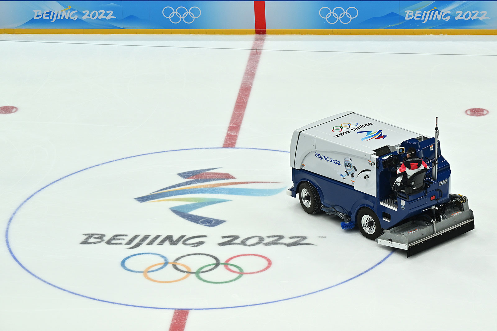 A worker drives a Zamboni ice resurfacing machine at the National Indoor Stadium in Beijing on January 31.