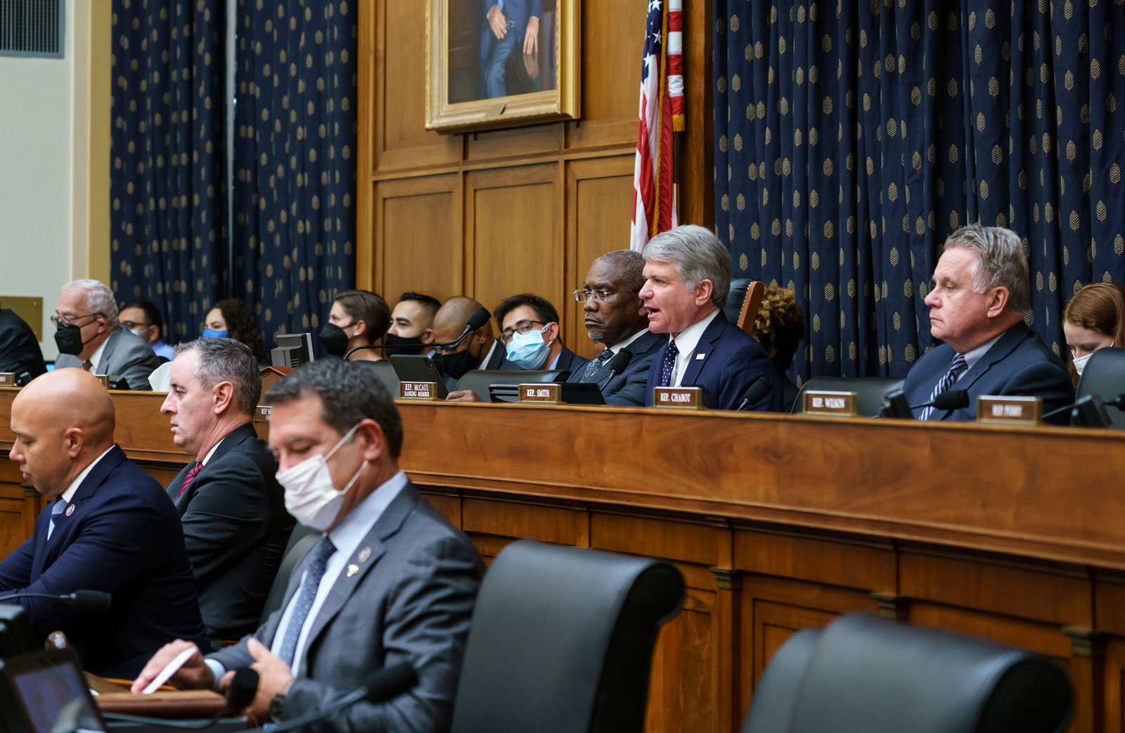 Rep. Michael McCaul, a member of the House Foreign Affairs Committee, joined at left by Chairman Gregory Meeks, discuss the U.S. withdrawal from Afghanistan with Secretary of State Antony Blinken who appeared remotely.